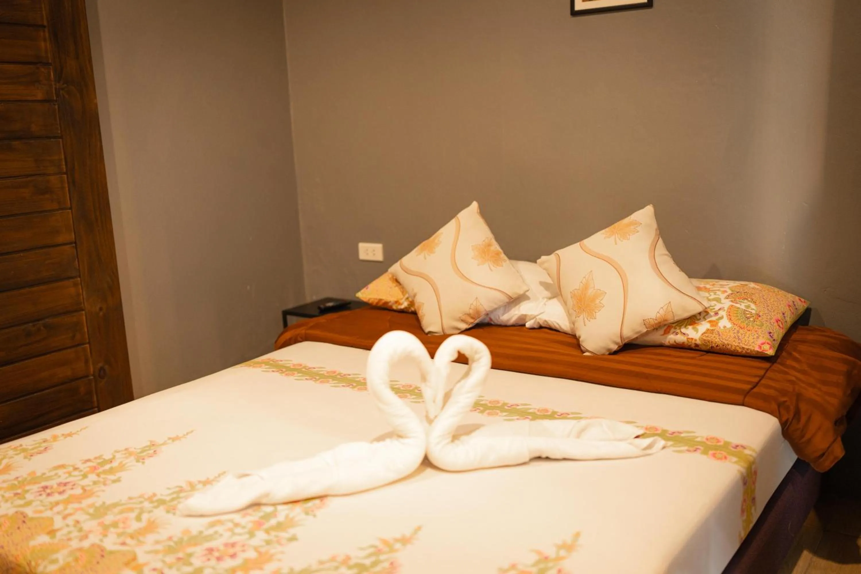 Bed in Baan Paea Guest House