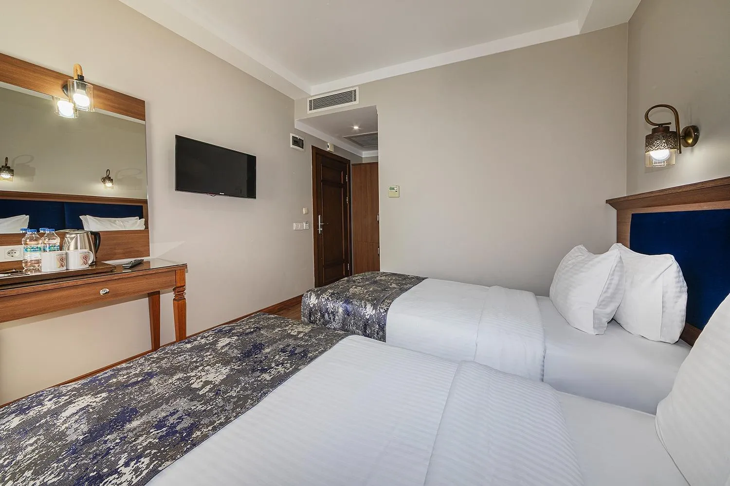 Bed in Aristocrat Hotel