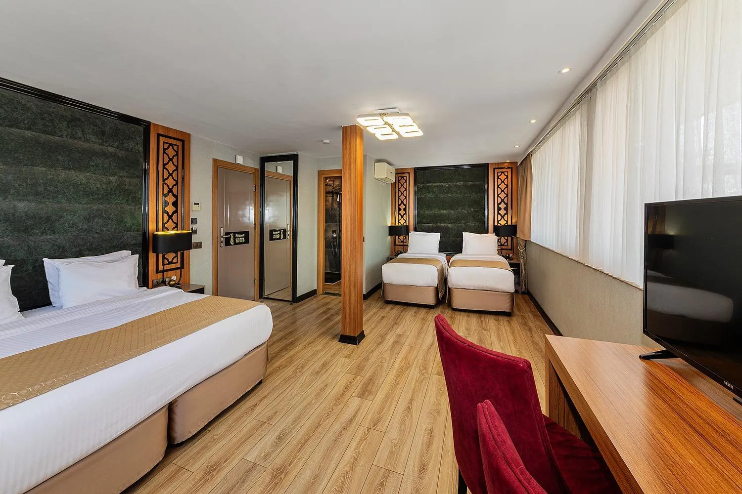 Bed in Aristocrat Hotel