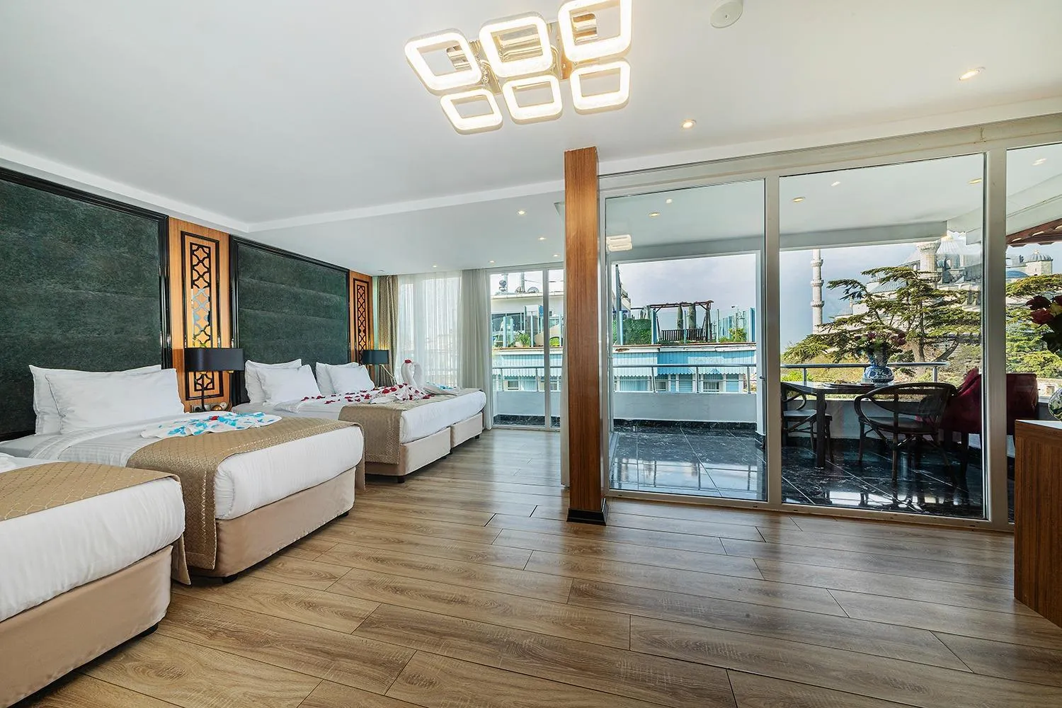 Bed in Aristocrat Hotel