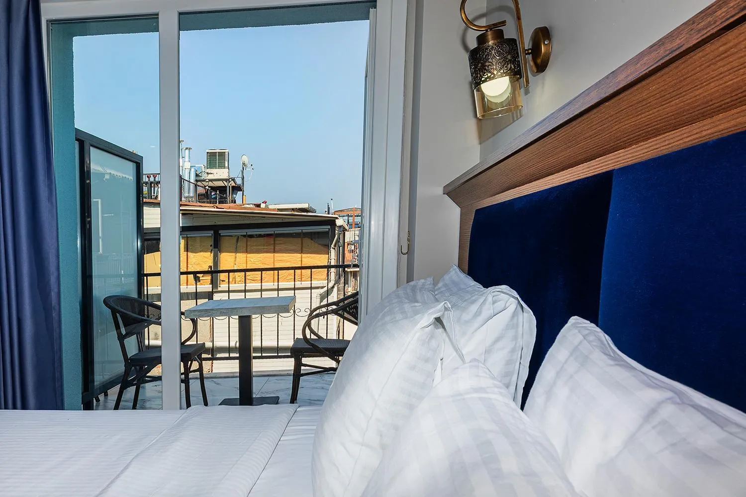 Bed in Aristocrat Hotel