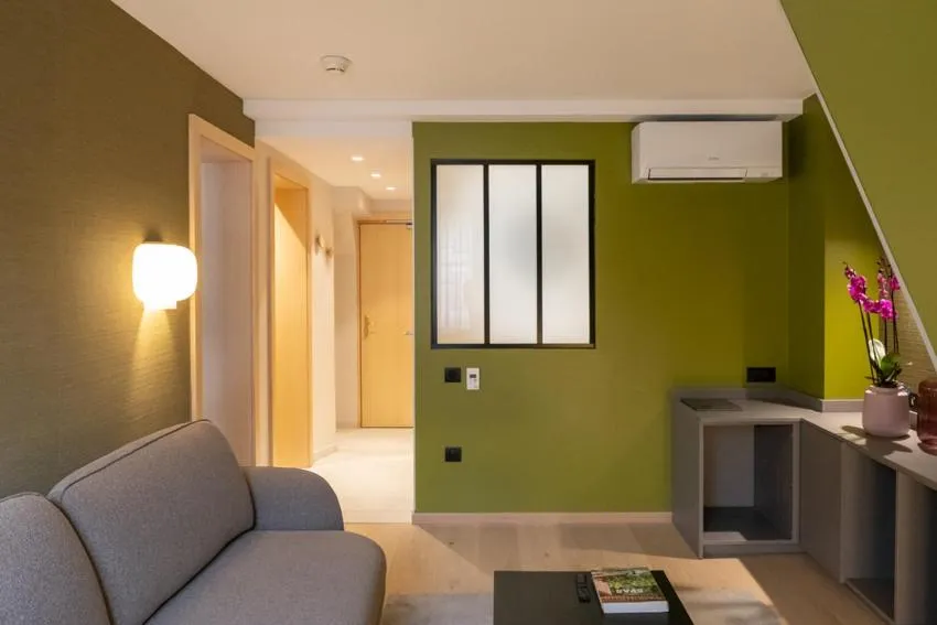 Seating area in Logis Hôtel Restaurant Au Cerf d'Or