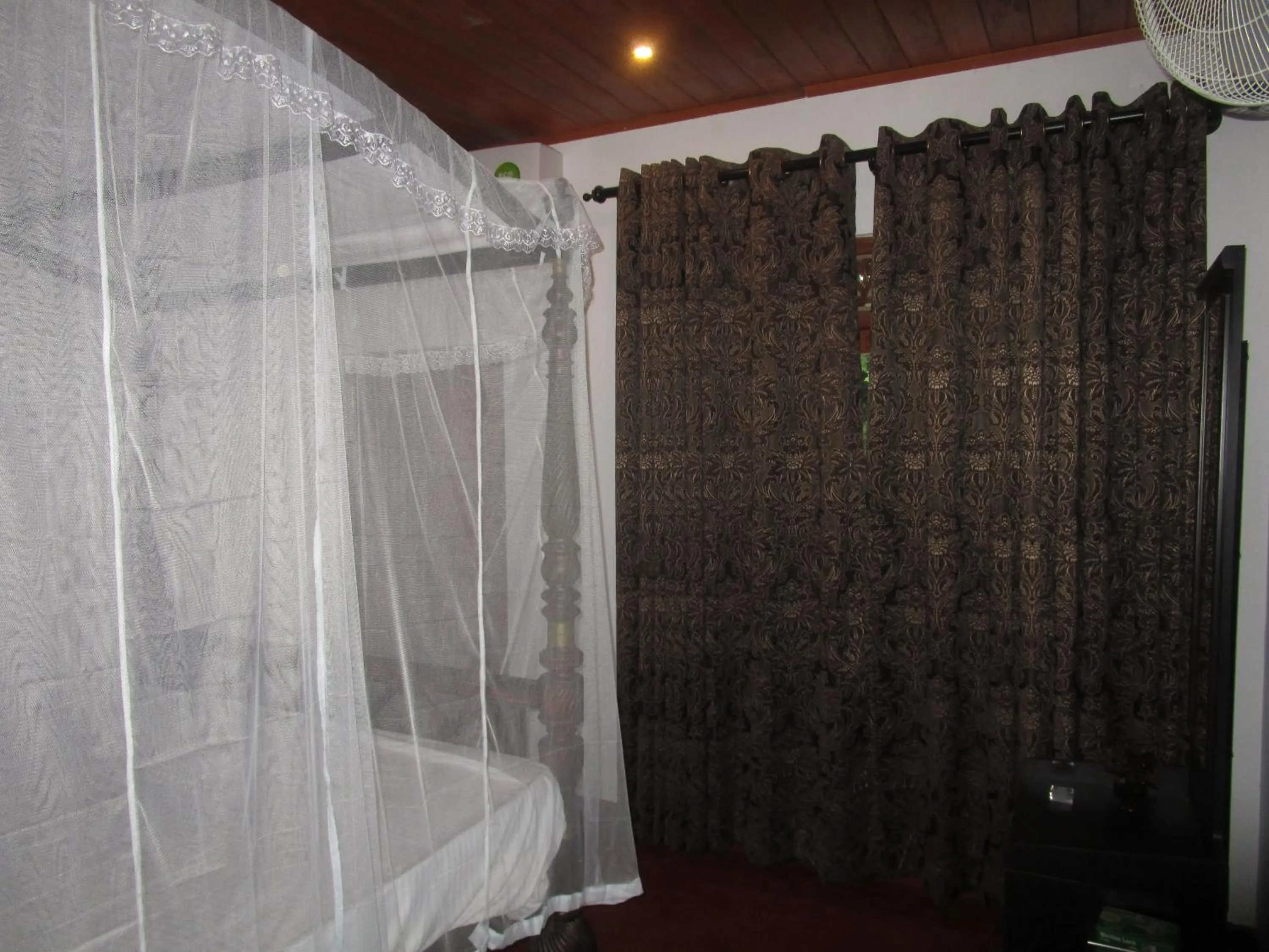 Bed in Green Herbal Ayurvedic Eco-Lodge