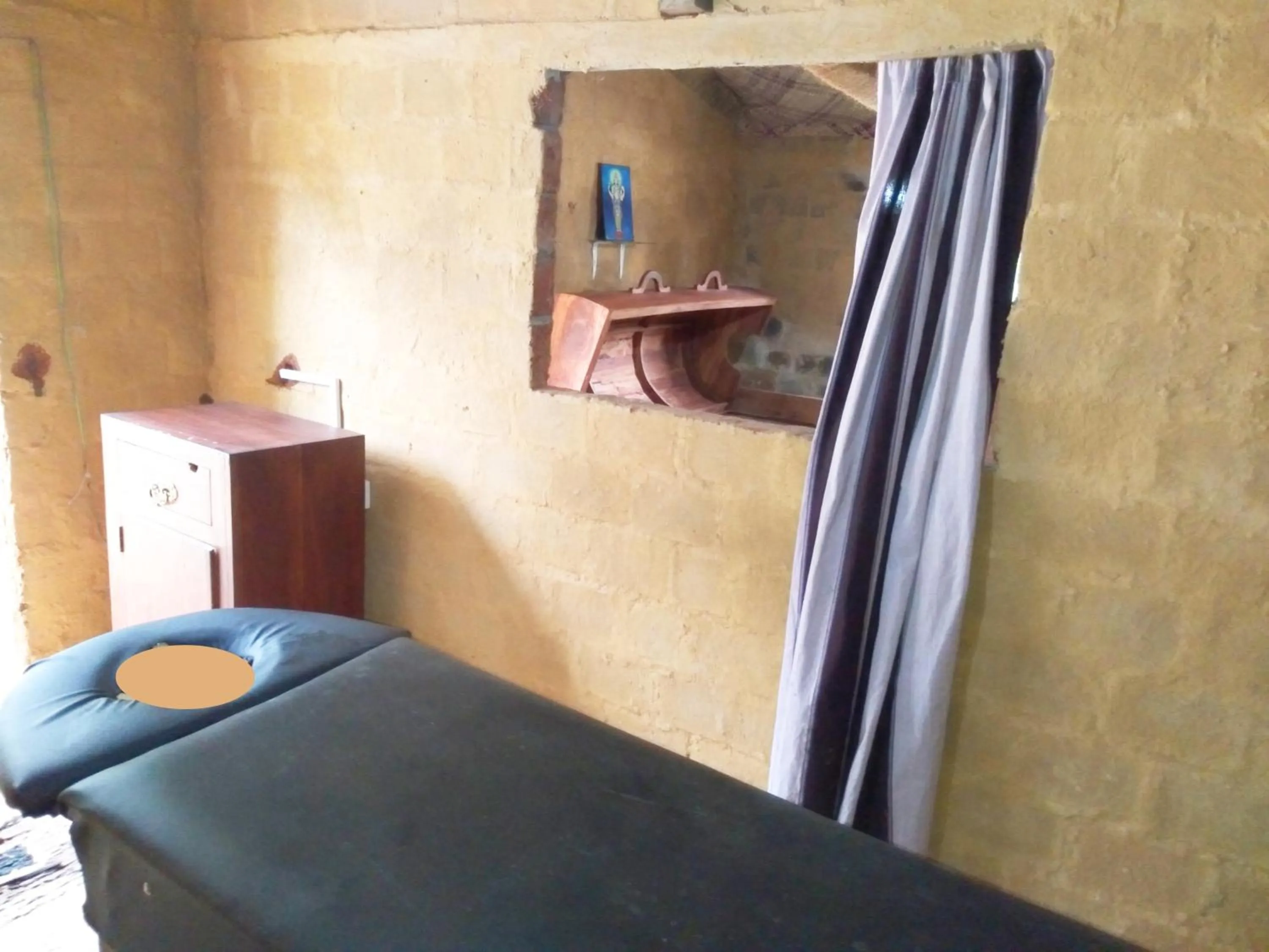 Bed in Green Herbal Ayurvedic Eco-Lodge