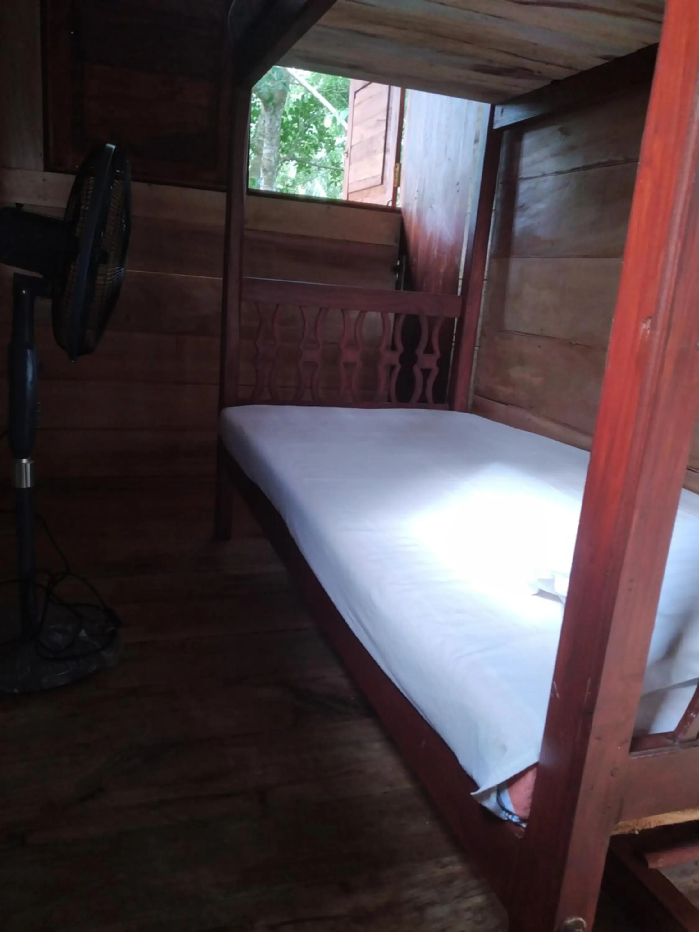 Bed in Green Herbal Ayurvedic Eco-Lodge