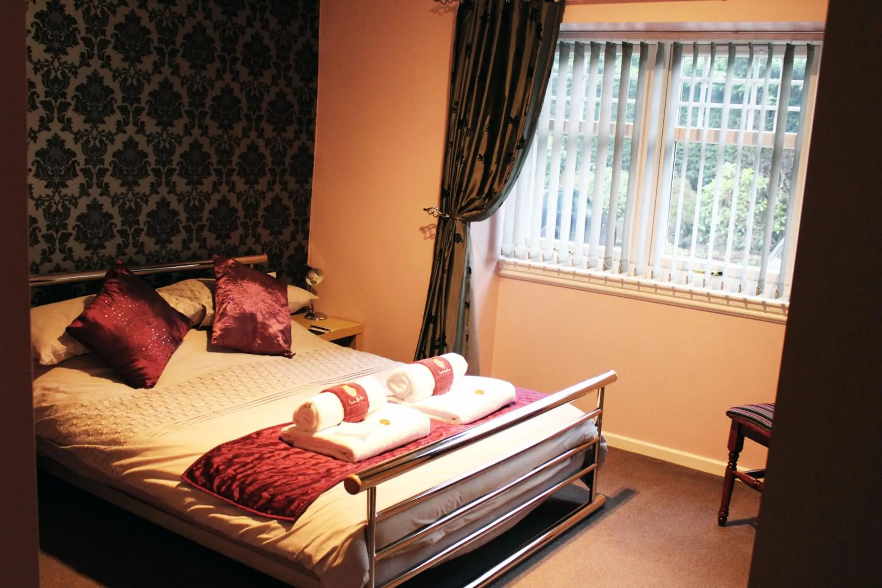Decorative detail, Bed in Grimscote Manor Hotel