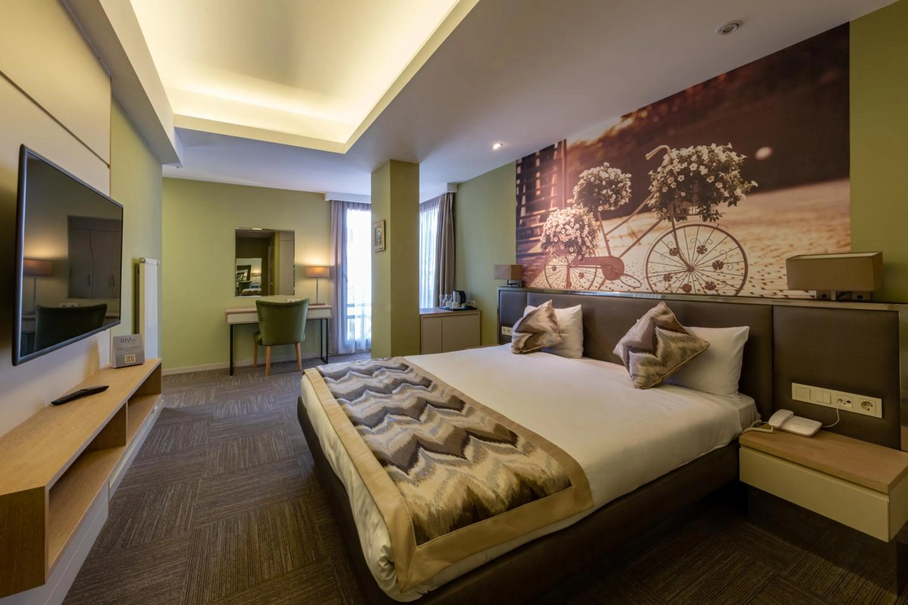 Photo of the whole room, Bed in Riva's Moda