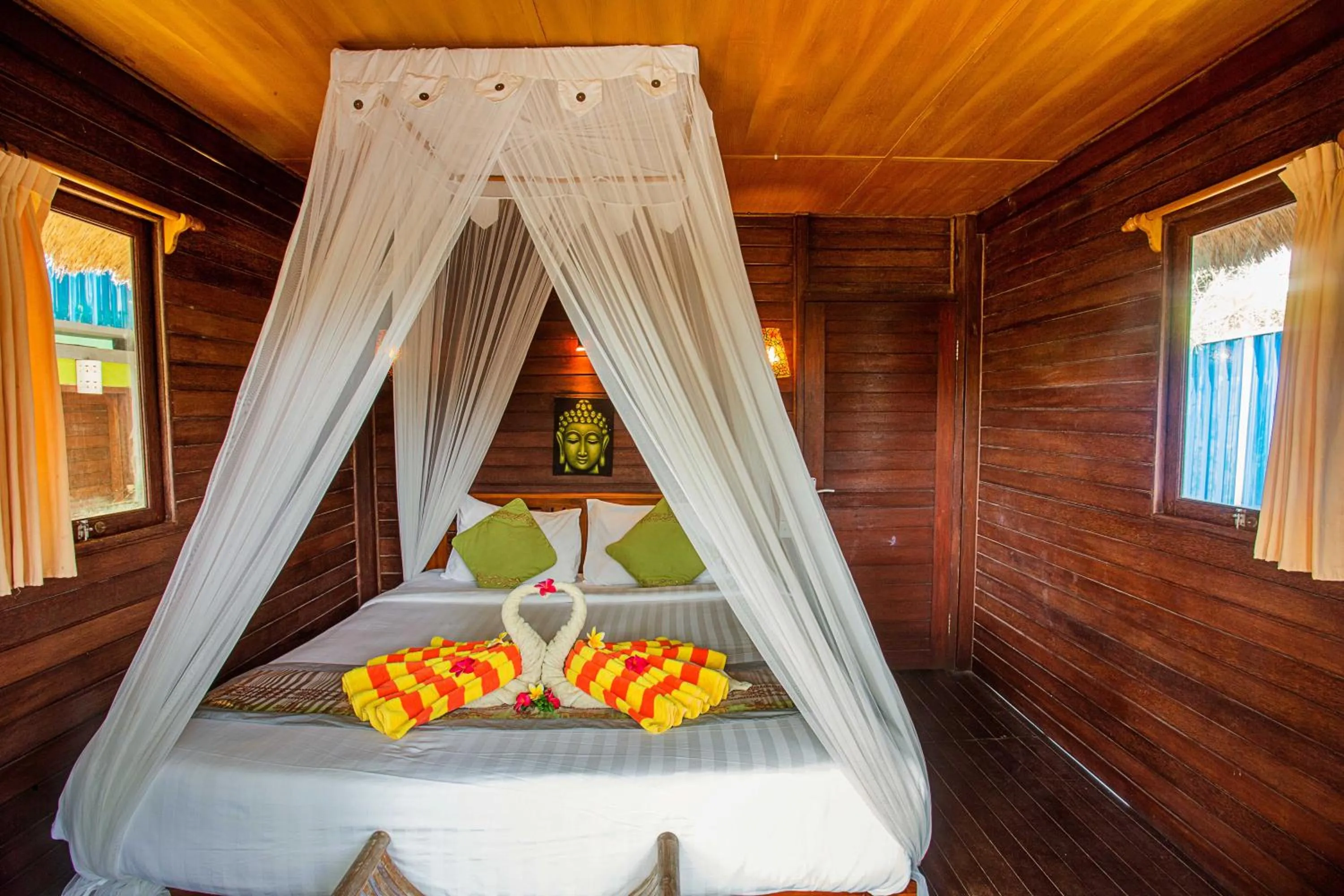 Photo of the whole room, Bed in Nanuk's Bungalows