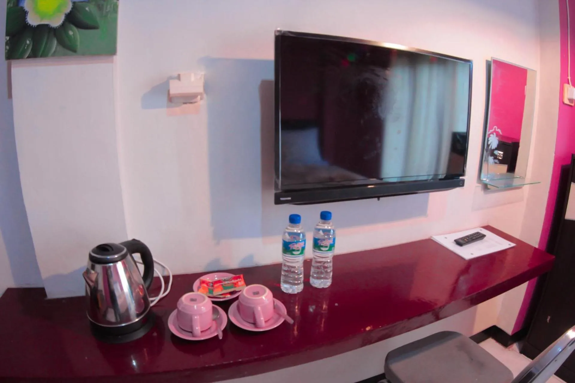 TV and multimedia in Hotel FX72 Ruteng