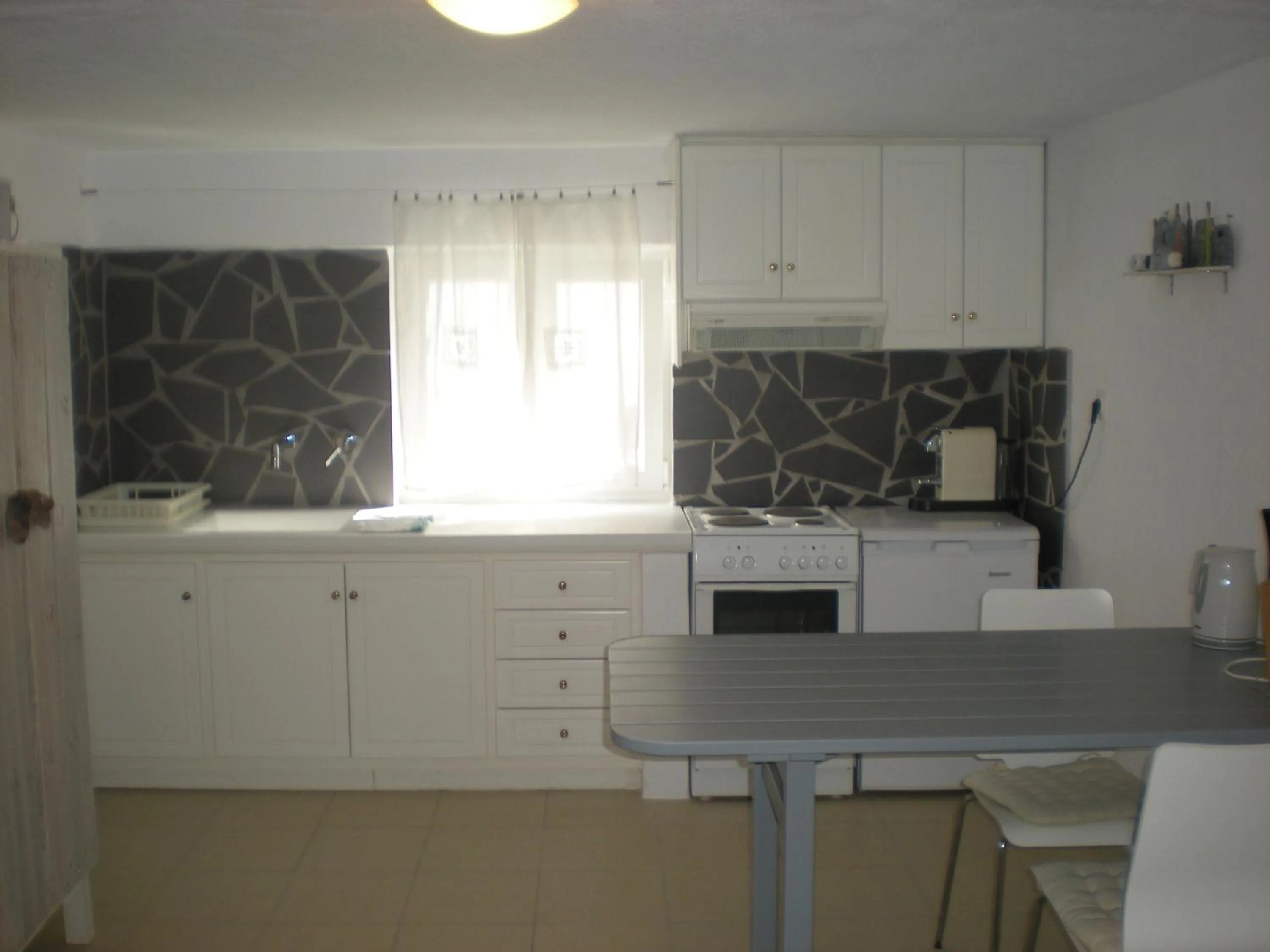 Kitchen or kitchenette in Manolis' House