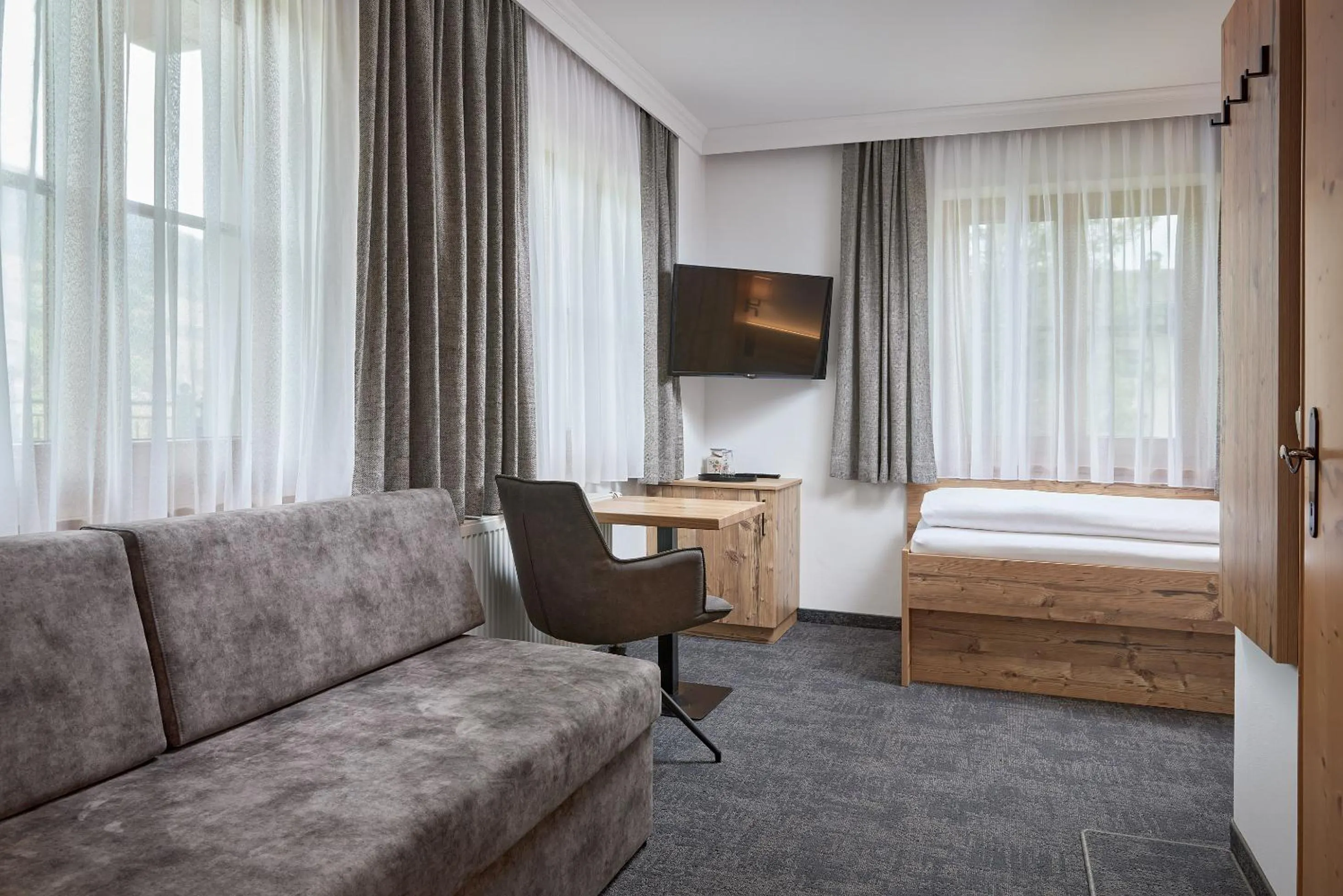 Living room, Bed in Hotel Gasthof Siggen