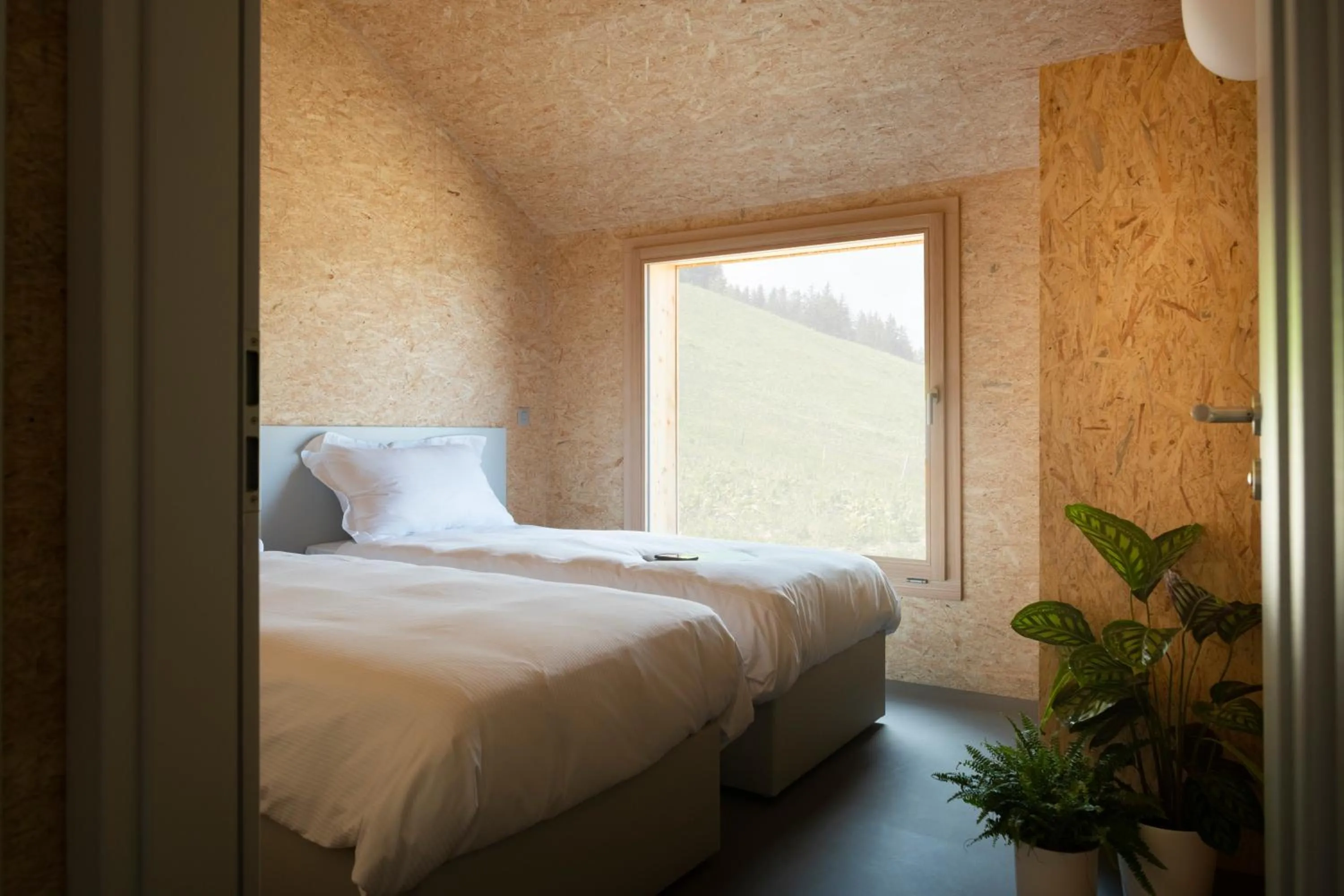 Property building, Bed in Whitepod Original