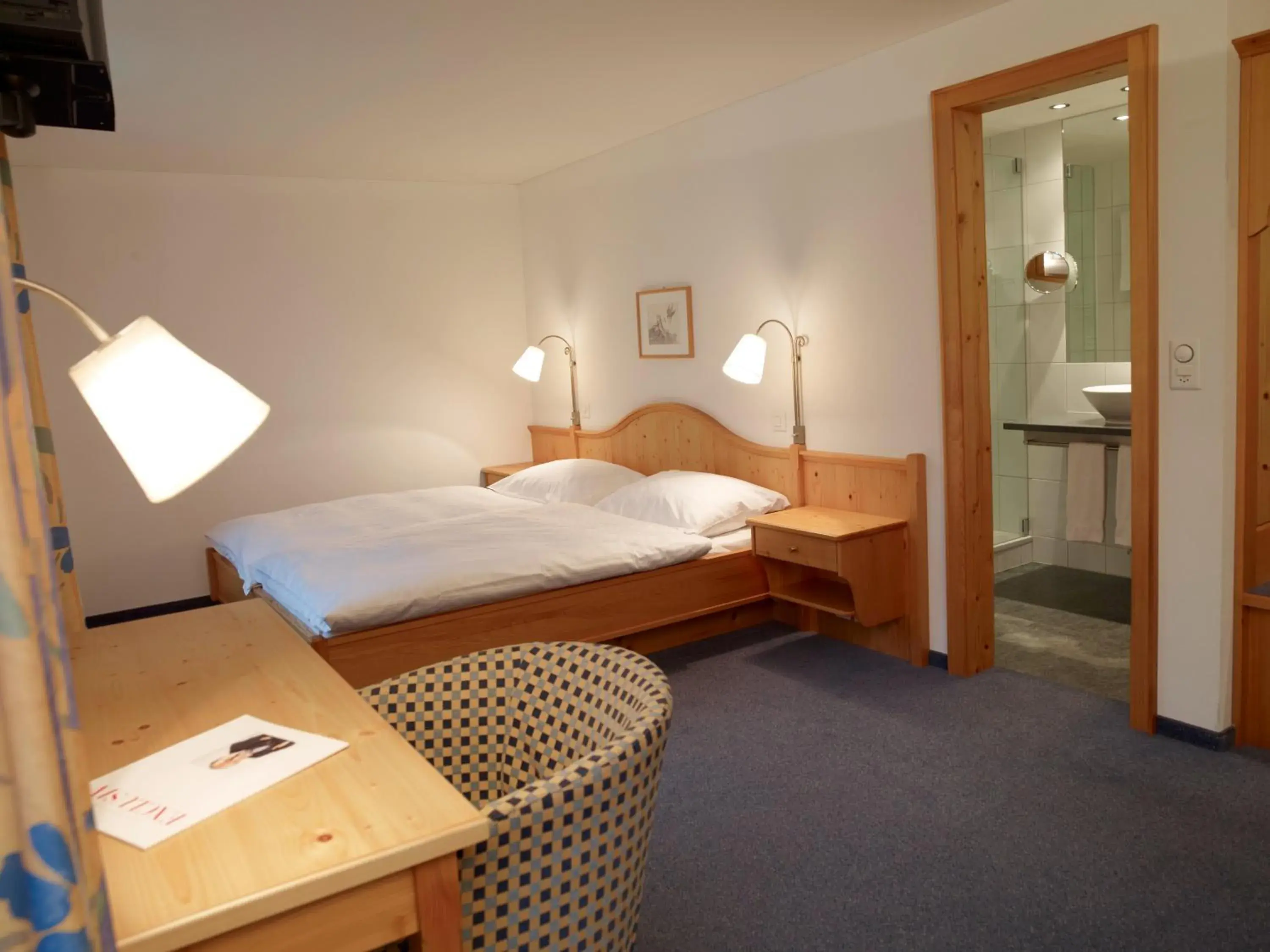 Photo of the whole room, Bed in Hotel Alpina Parpan Photo of the whole room, Bed in Hotel Alpina Parpan