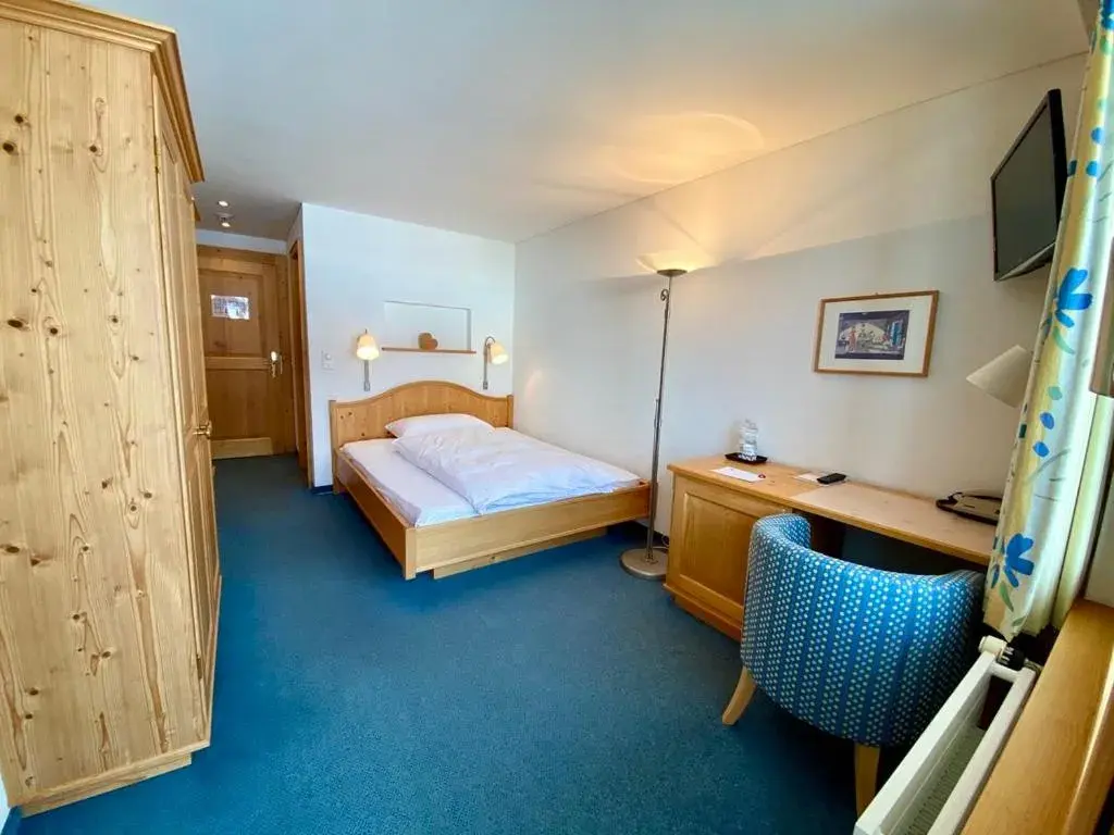 Bed in Hotel Alpina Parpan Bed in Hotel Alpina Parpan