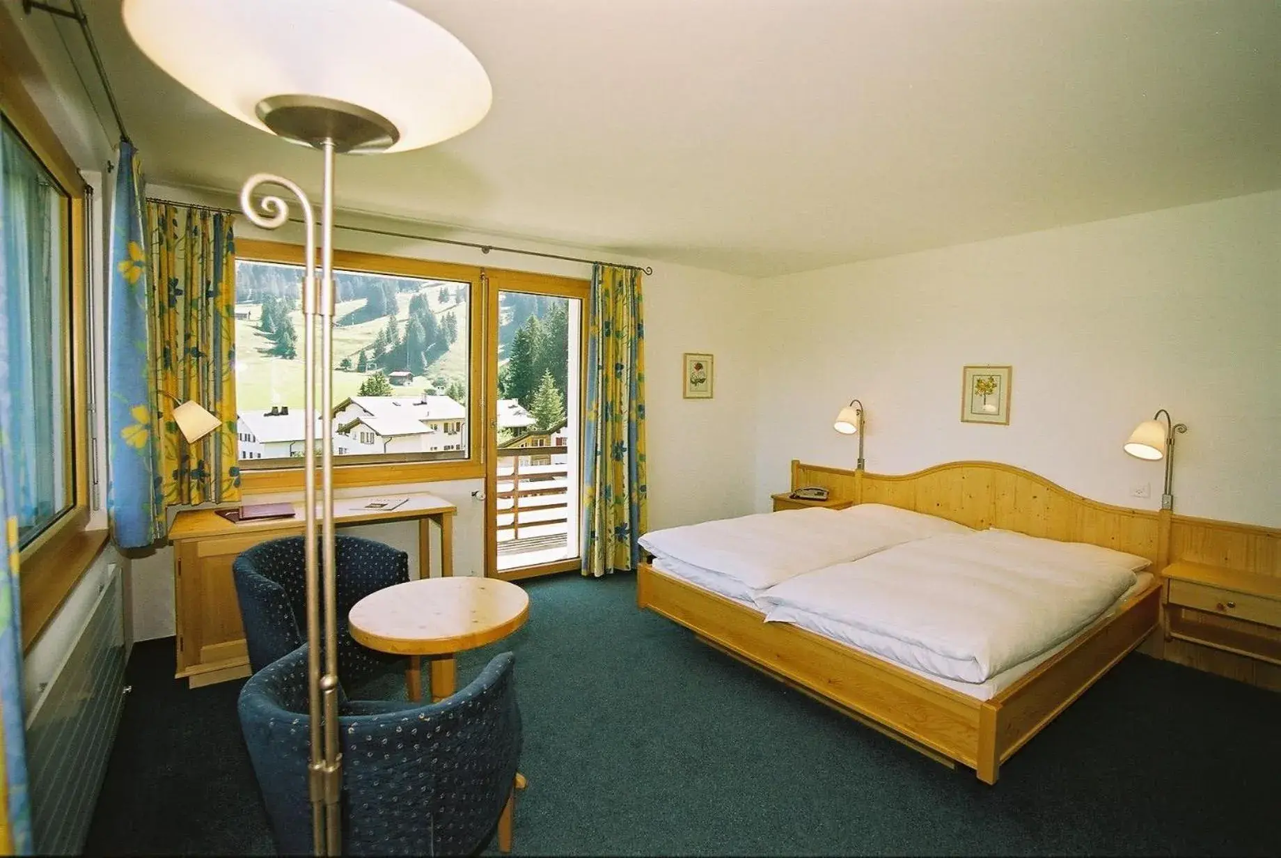 Photo of the whole room, Bed in Hotel Alpina Parpan Photo of the whole room, Bed in Hotel Alpina Parpan