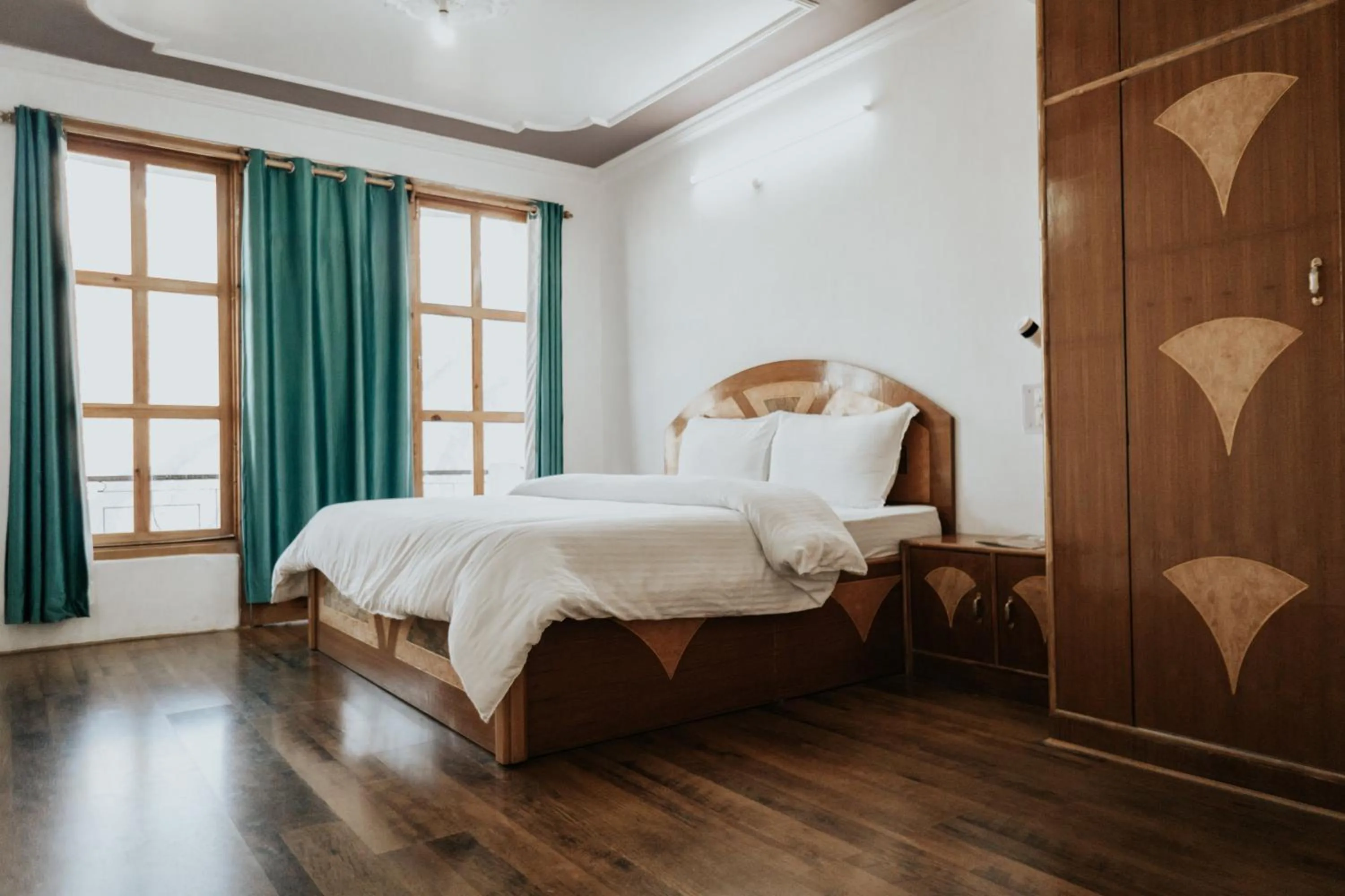 Bed in Hotel Kalpa Deshang