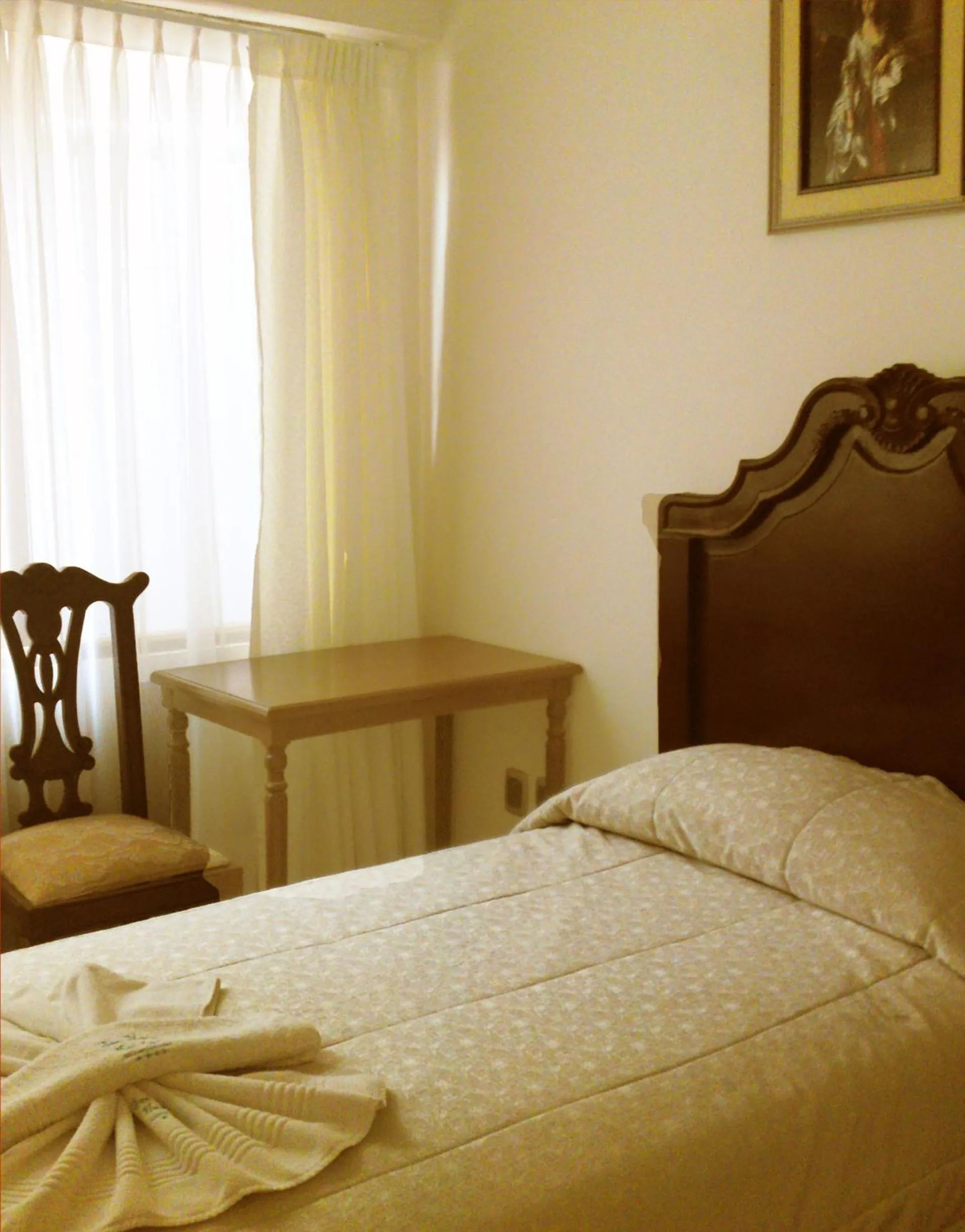 Bed in San Marino Royal Hotel