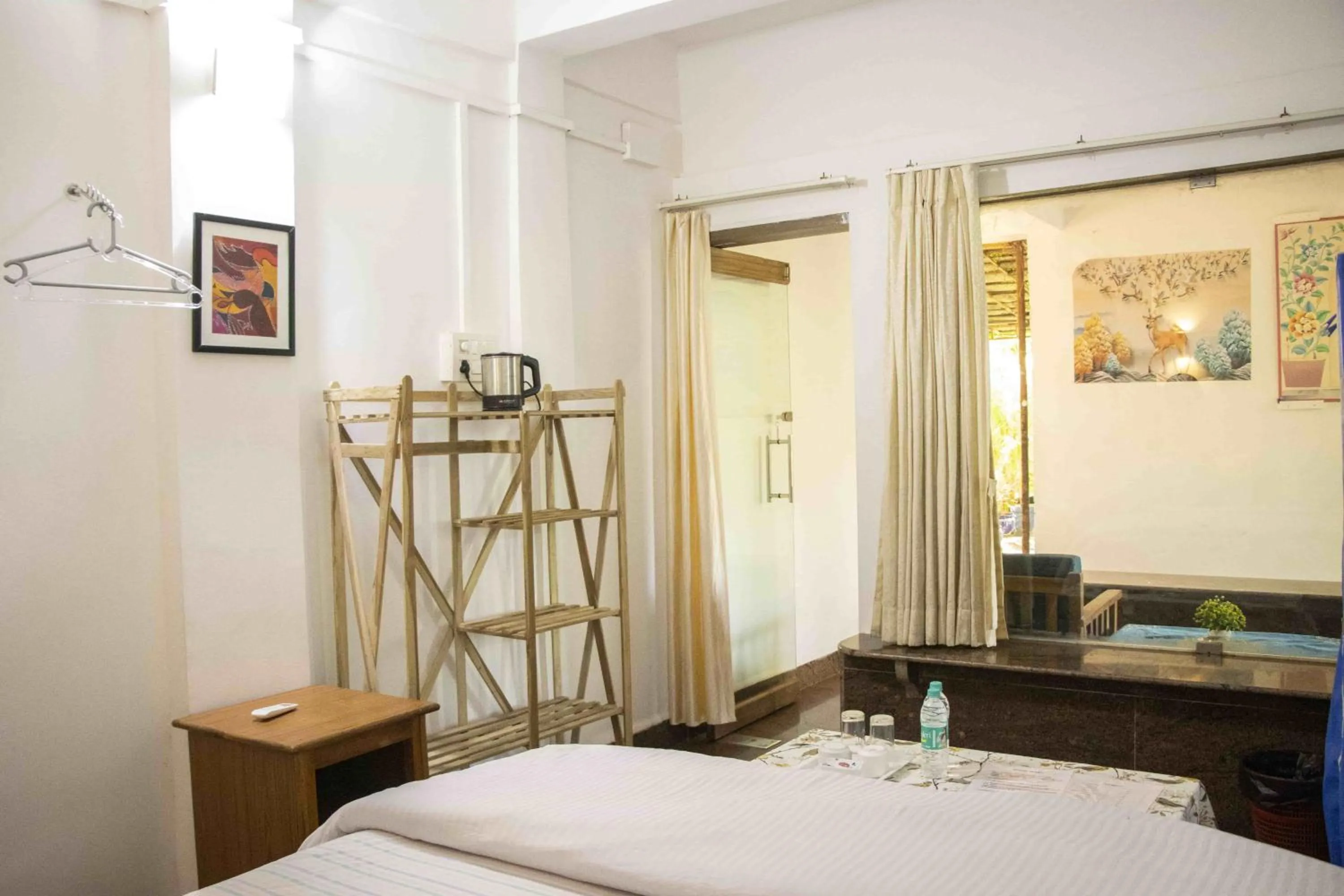 Bed in Secret Garden Agonda Beach Resort