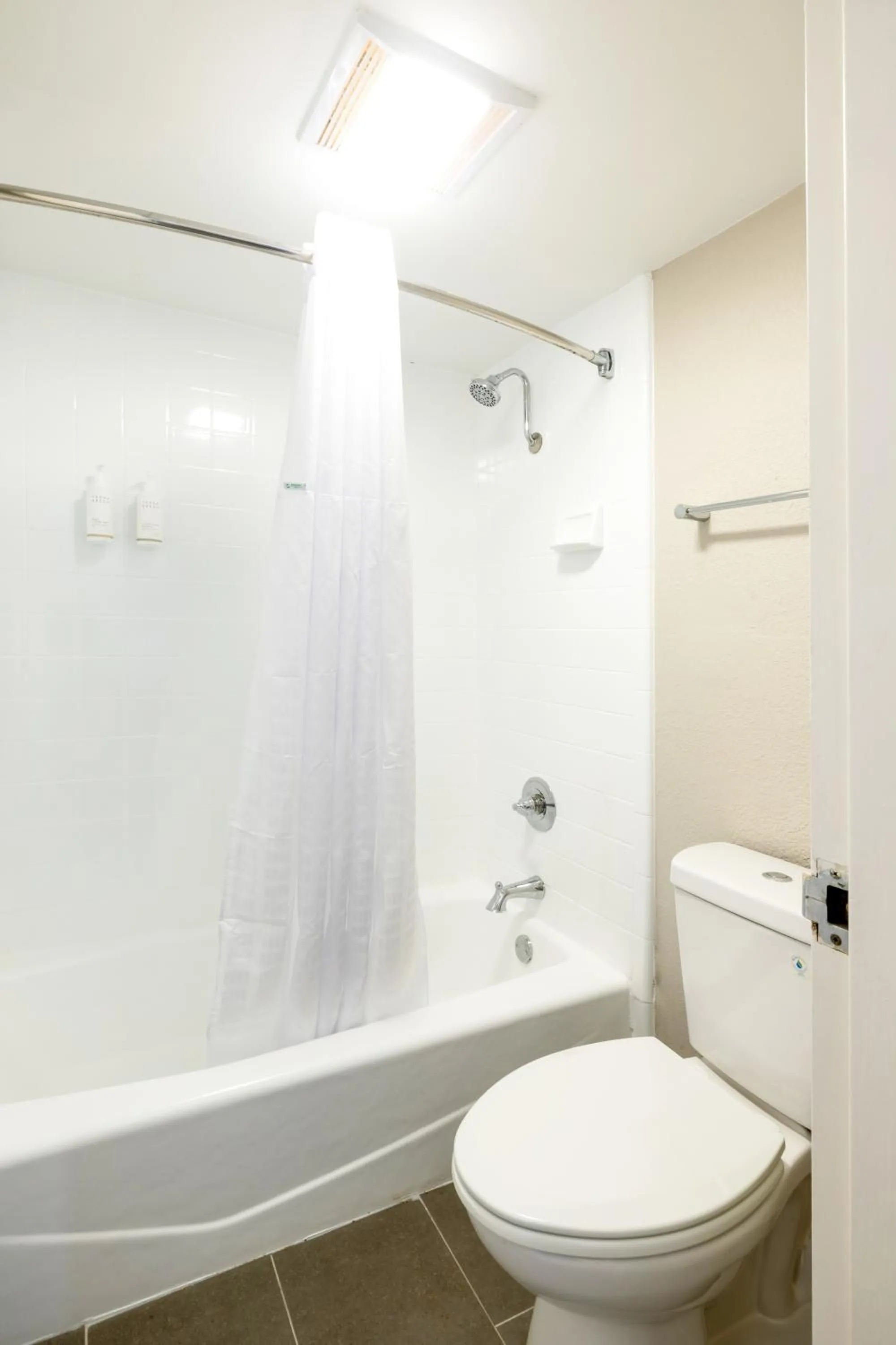 Shower in Days Inn & Suites by Wyndham Bossier City - Casino Area