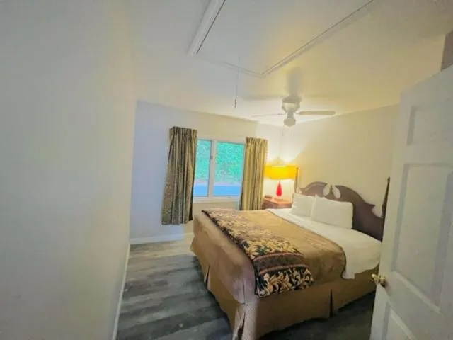 Bed in Exit 5 Resort & Condominium