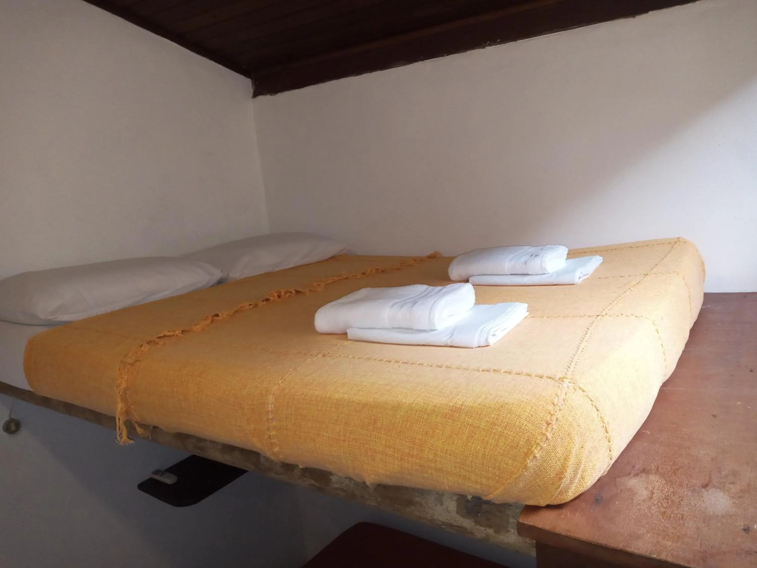 Bed in Pousada Cachoeira