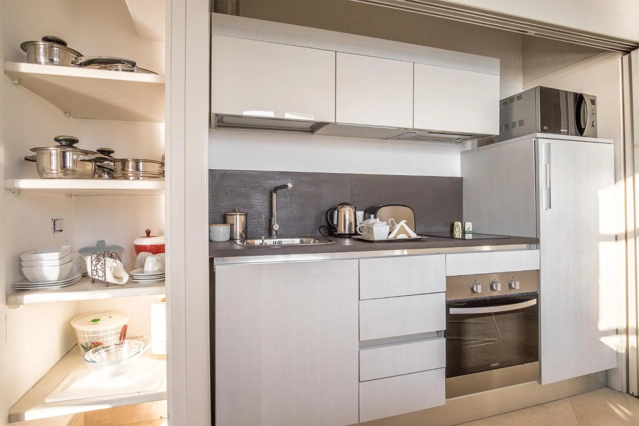 Kitchen or kitchenette in Palazzo Alfeo Aparthotel