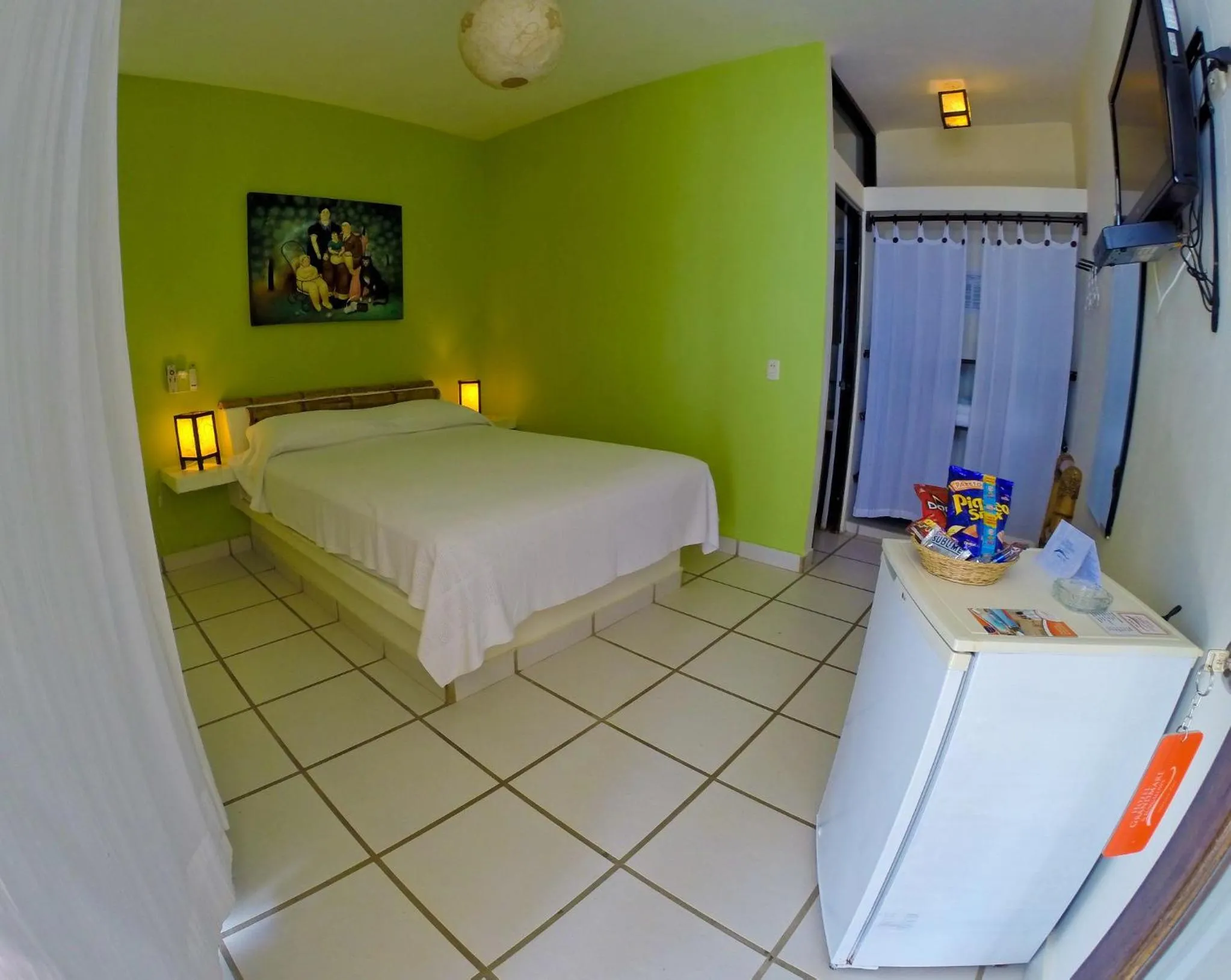 Bed in Hotel Grandmare & Bungalows