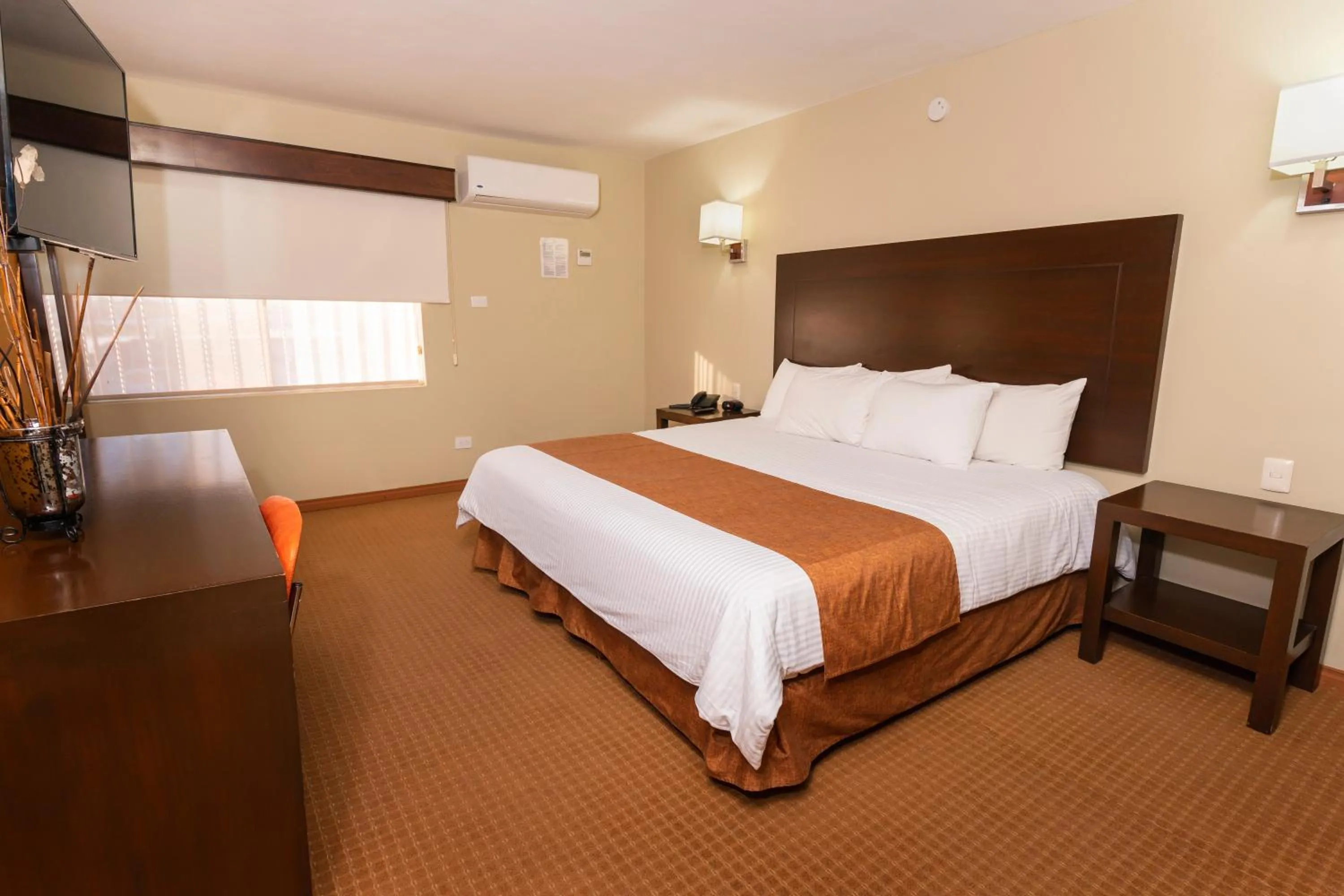 Bed in El Camino Hotel & Suites