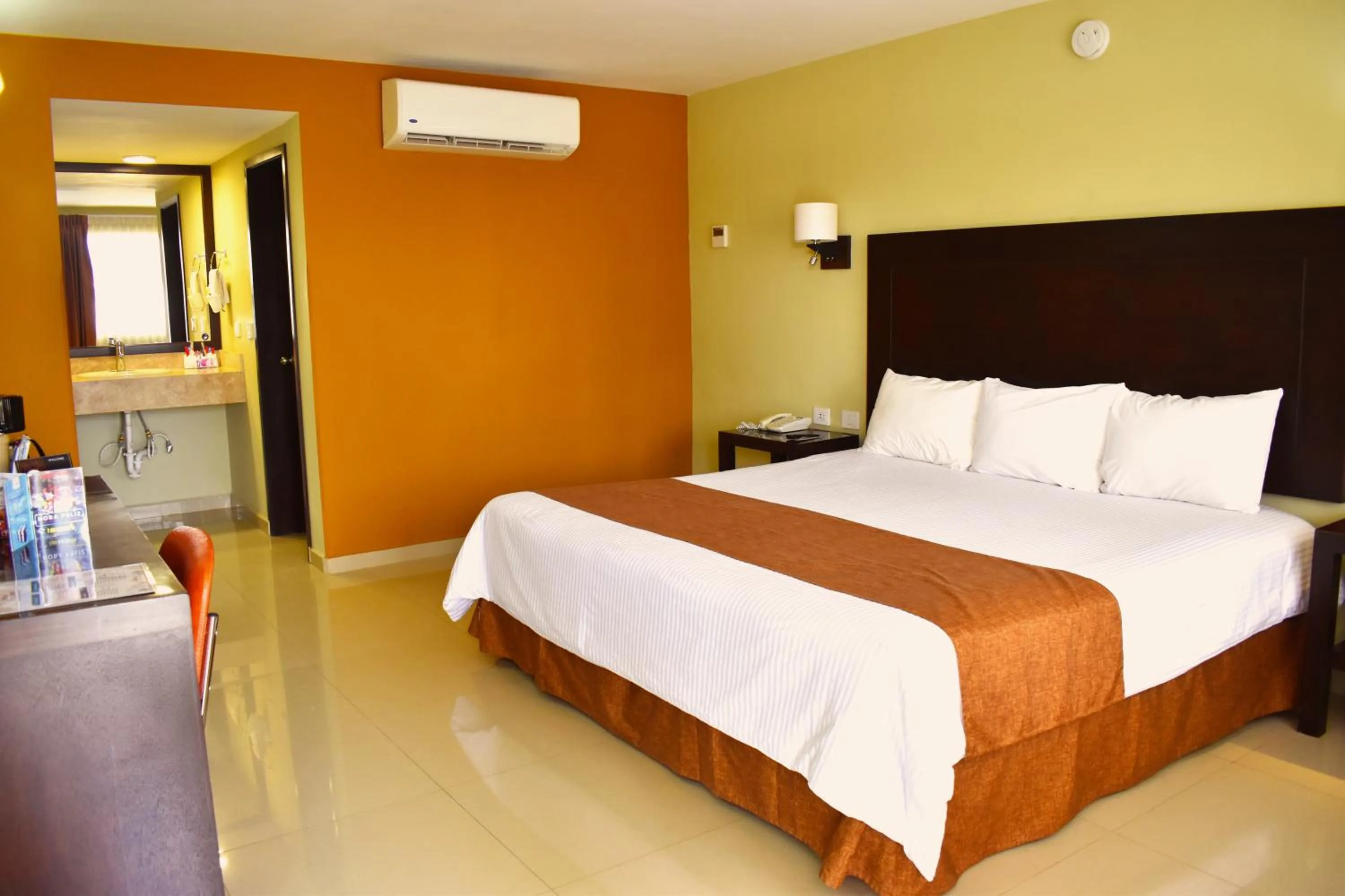 Bedroom in El Camino Hotel & Suites