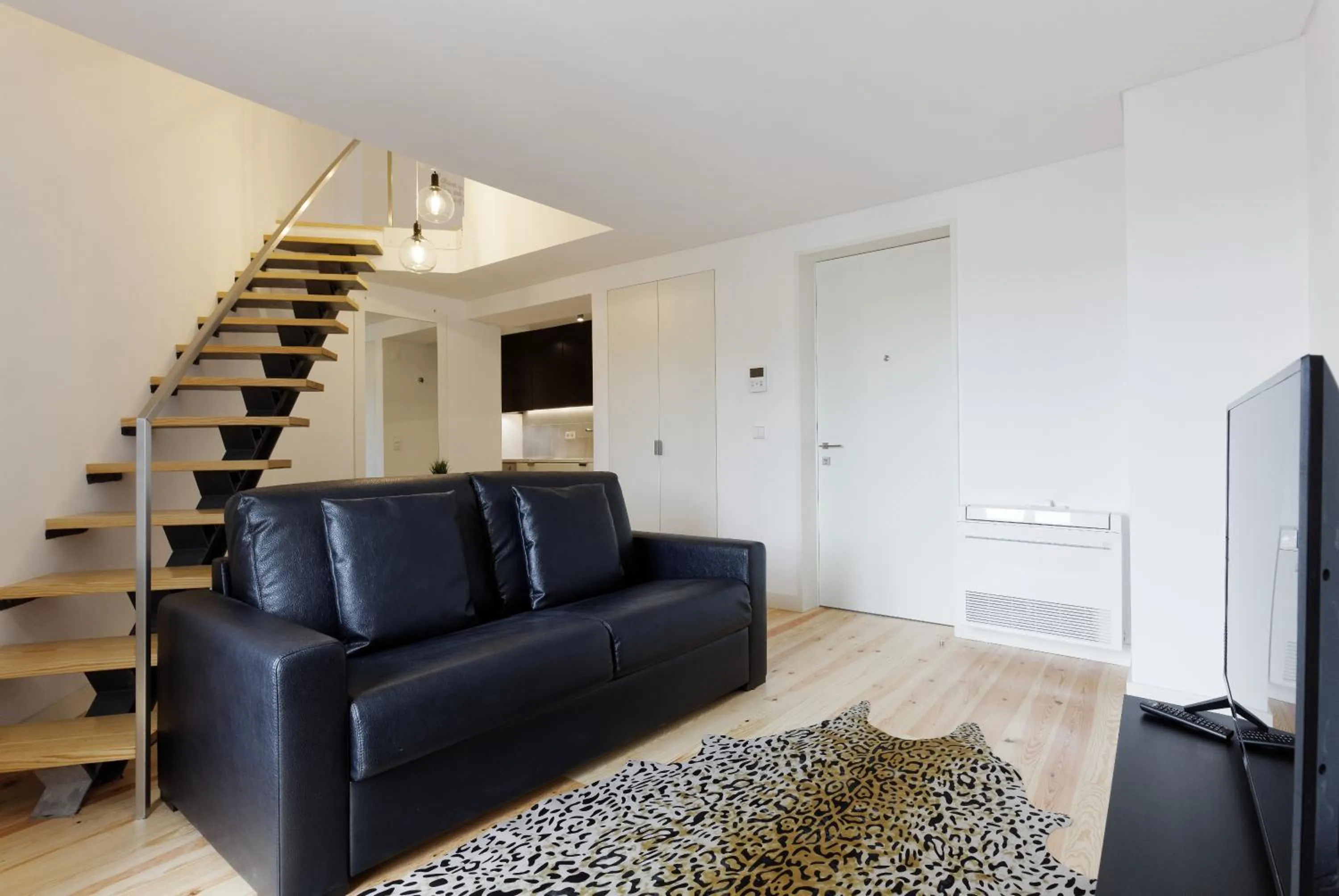 Kitchen or kitchenette in City Stays Alegria Apartments