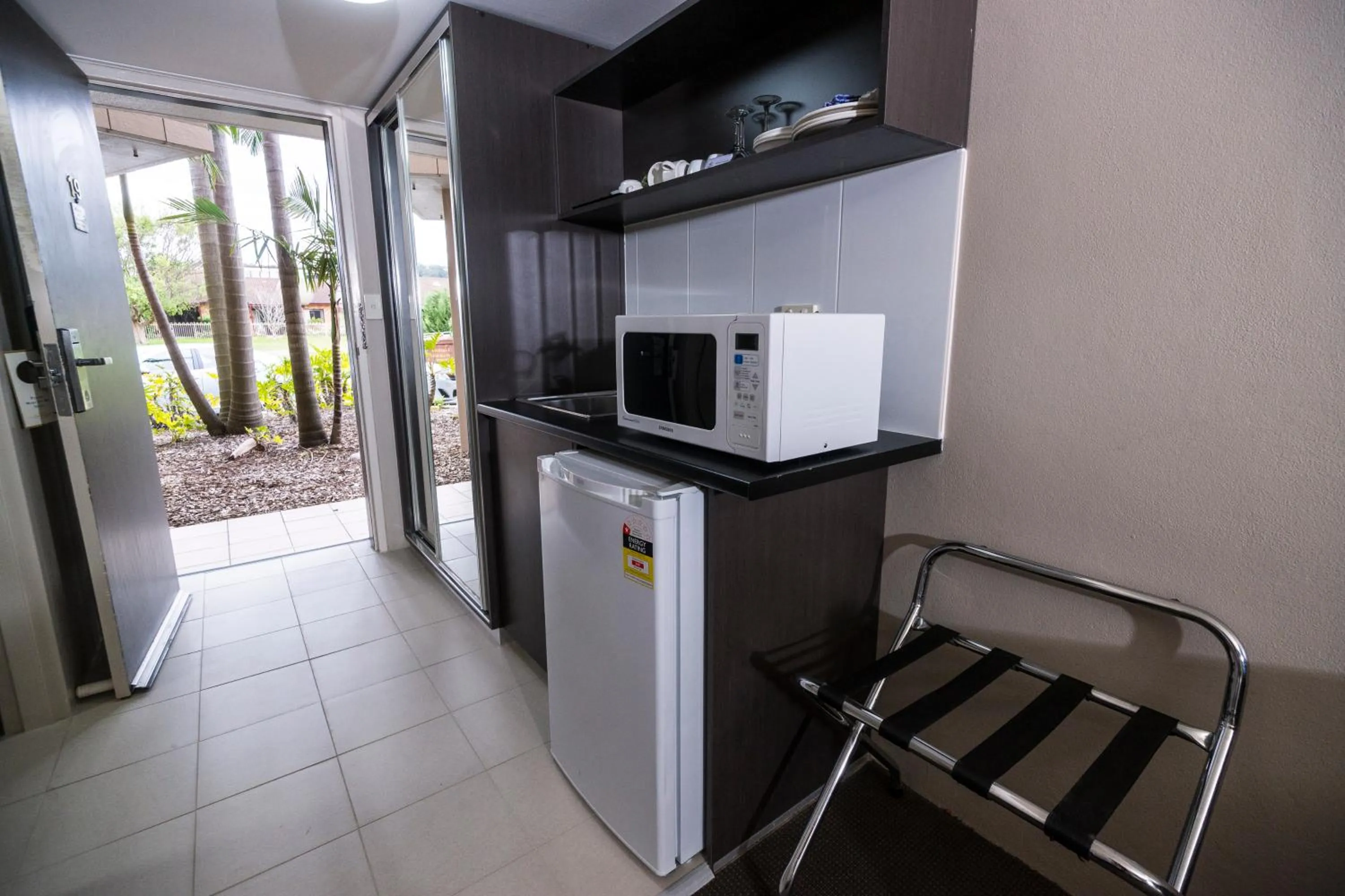 Kitchen or kitchenette in The Galaxy Motel