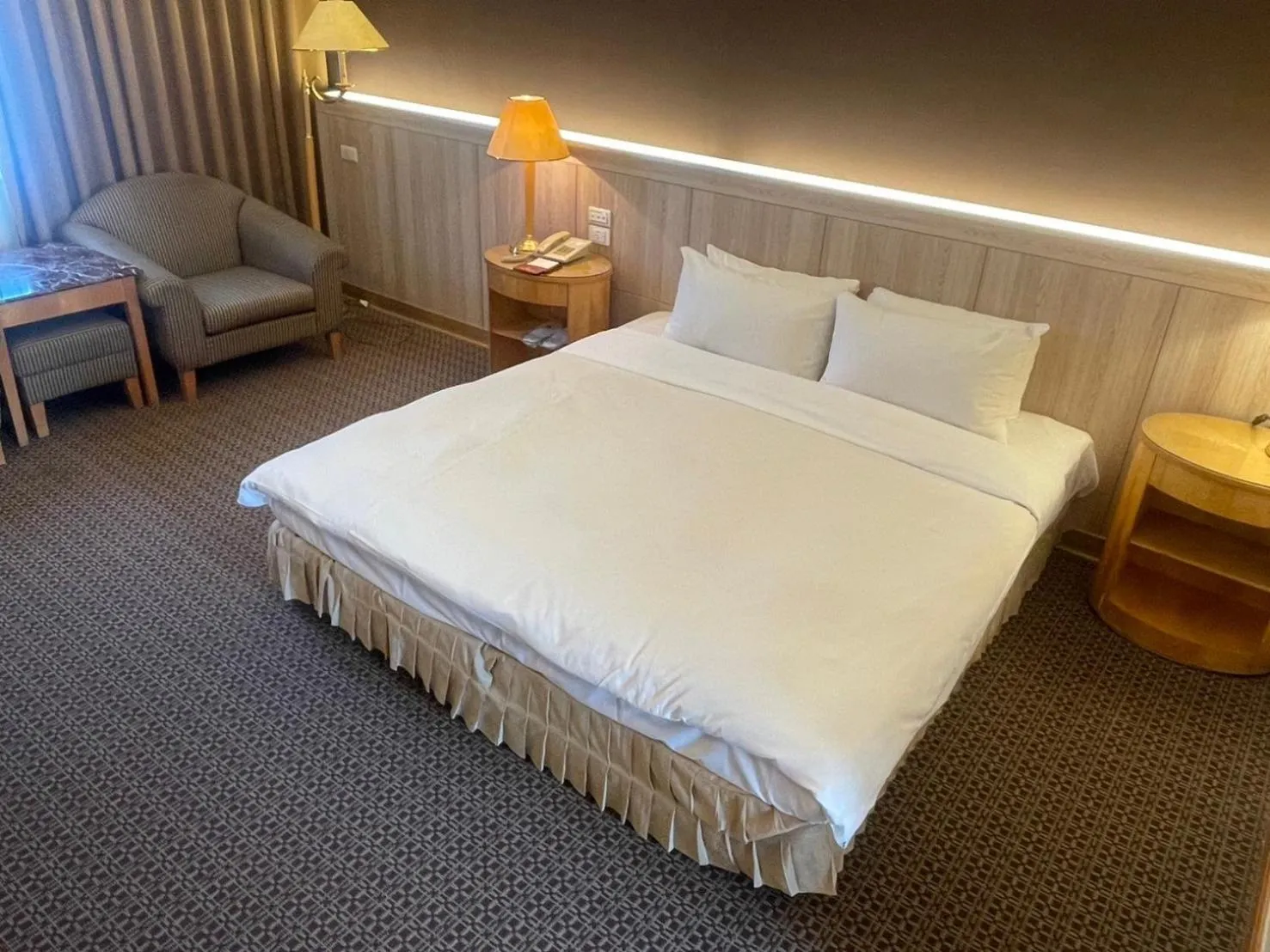 Bed in Chuto Plaza Hotel