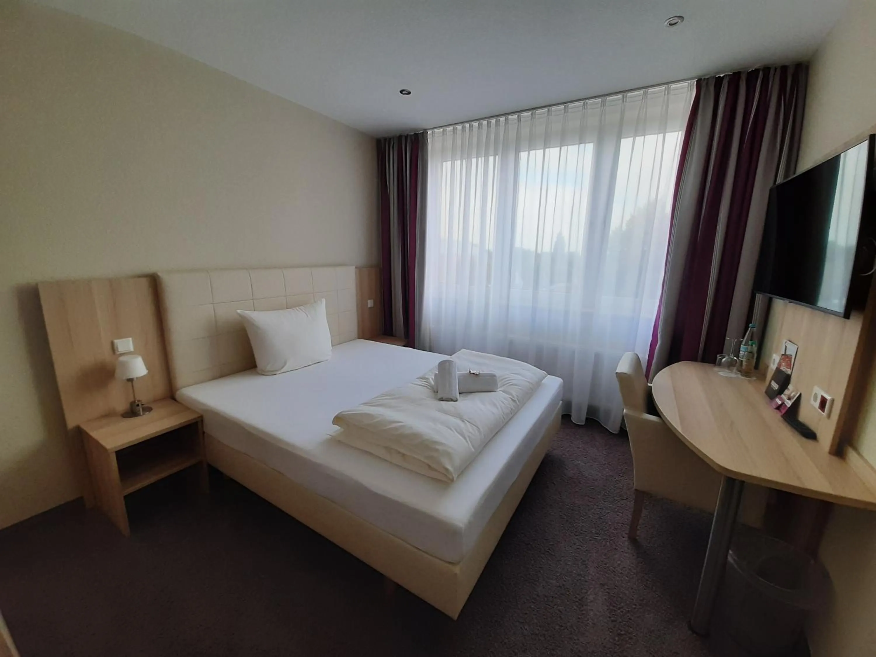 Bed in Hotel Siebenschläfer am Wasserturm