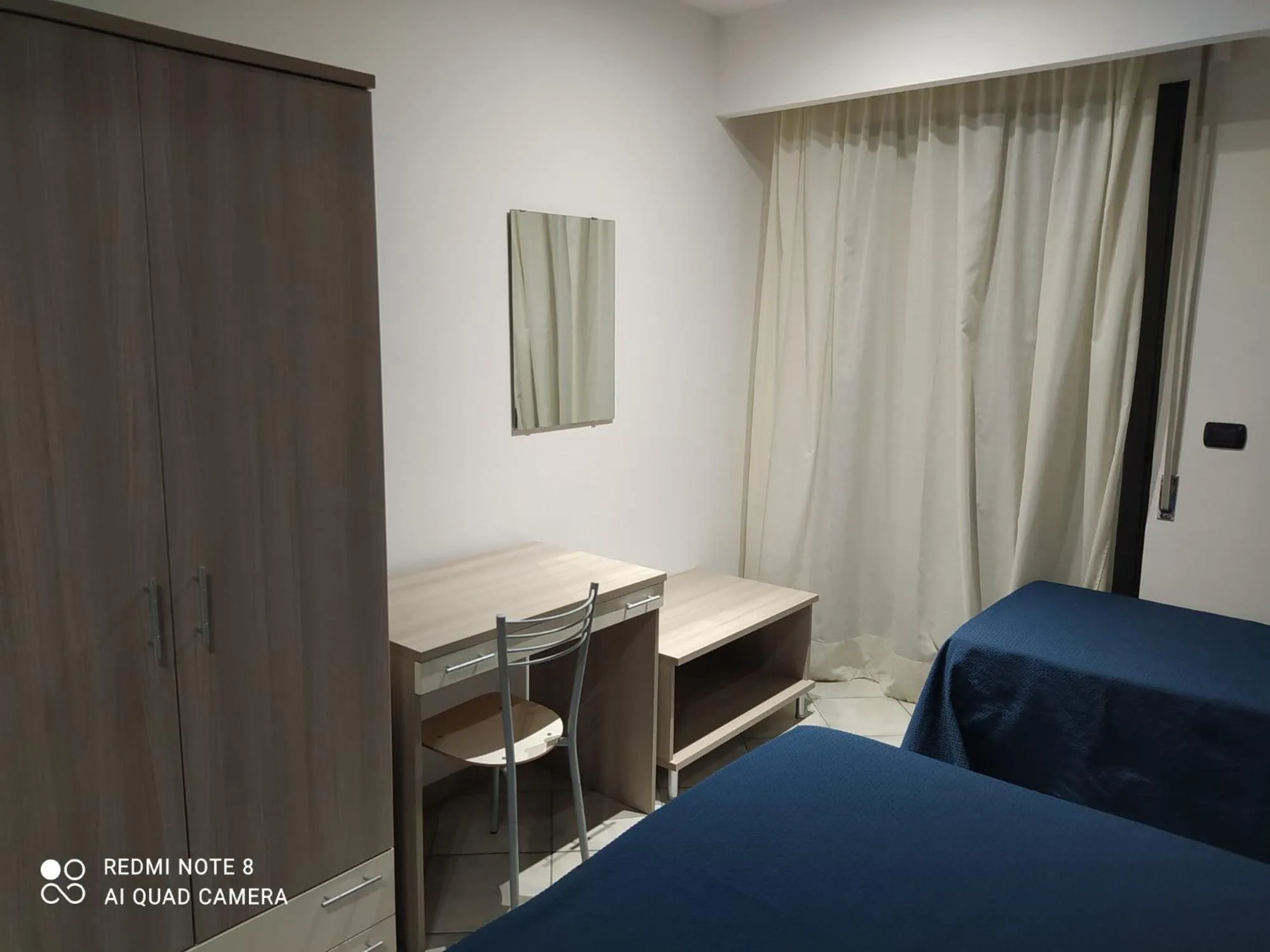 Bed in Hotel Poseidon