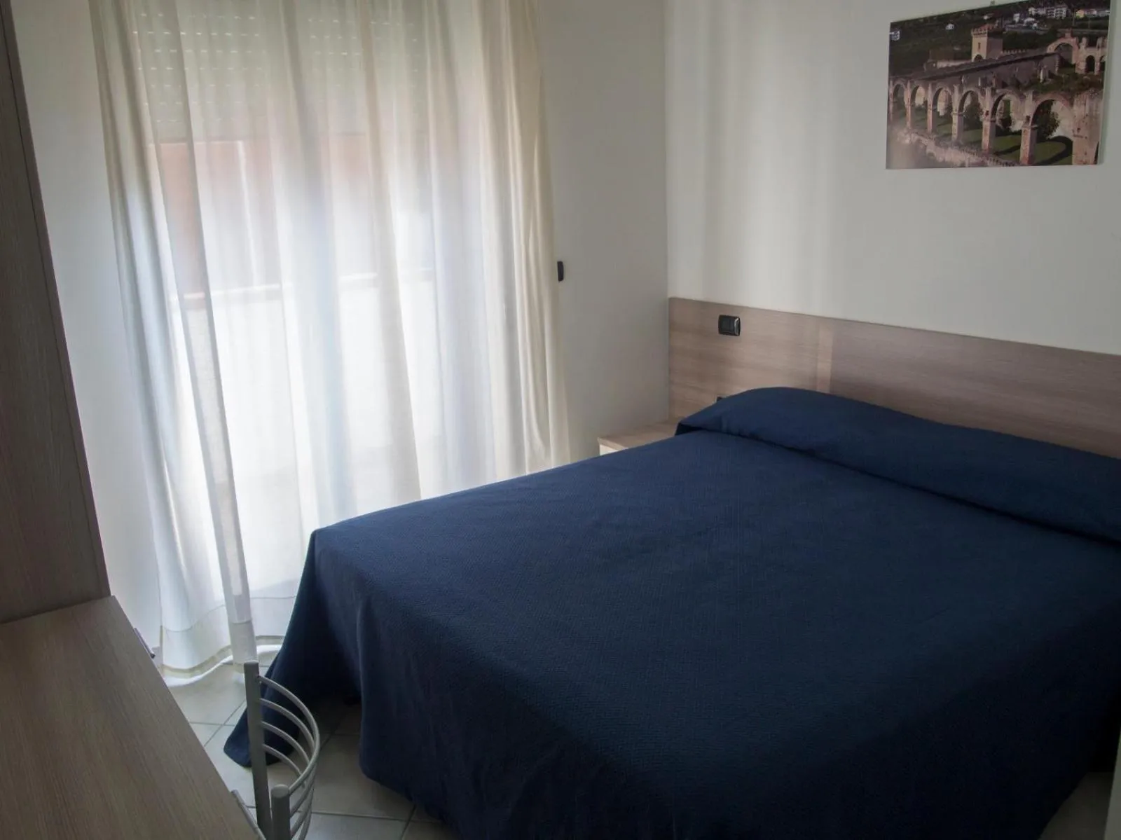 Bed in Hotel Poseidon