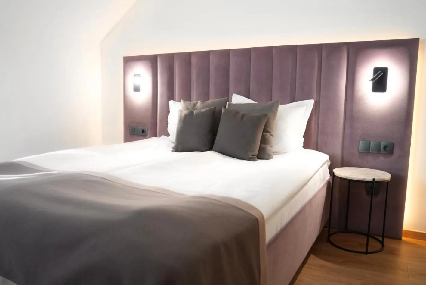 Bed in Bayer's City Hotel