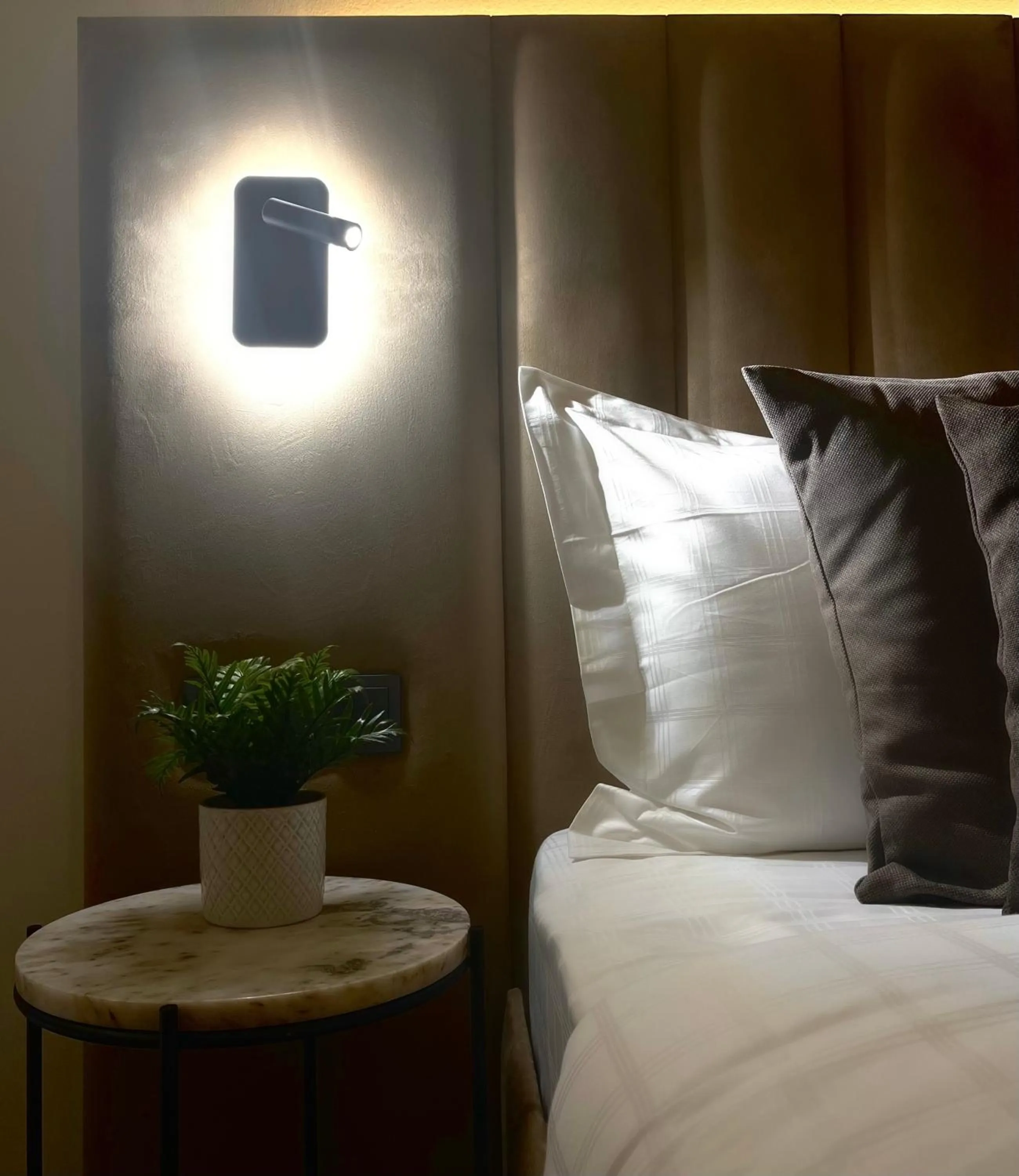 Bed in Bayer's City Hotel