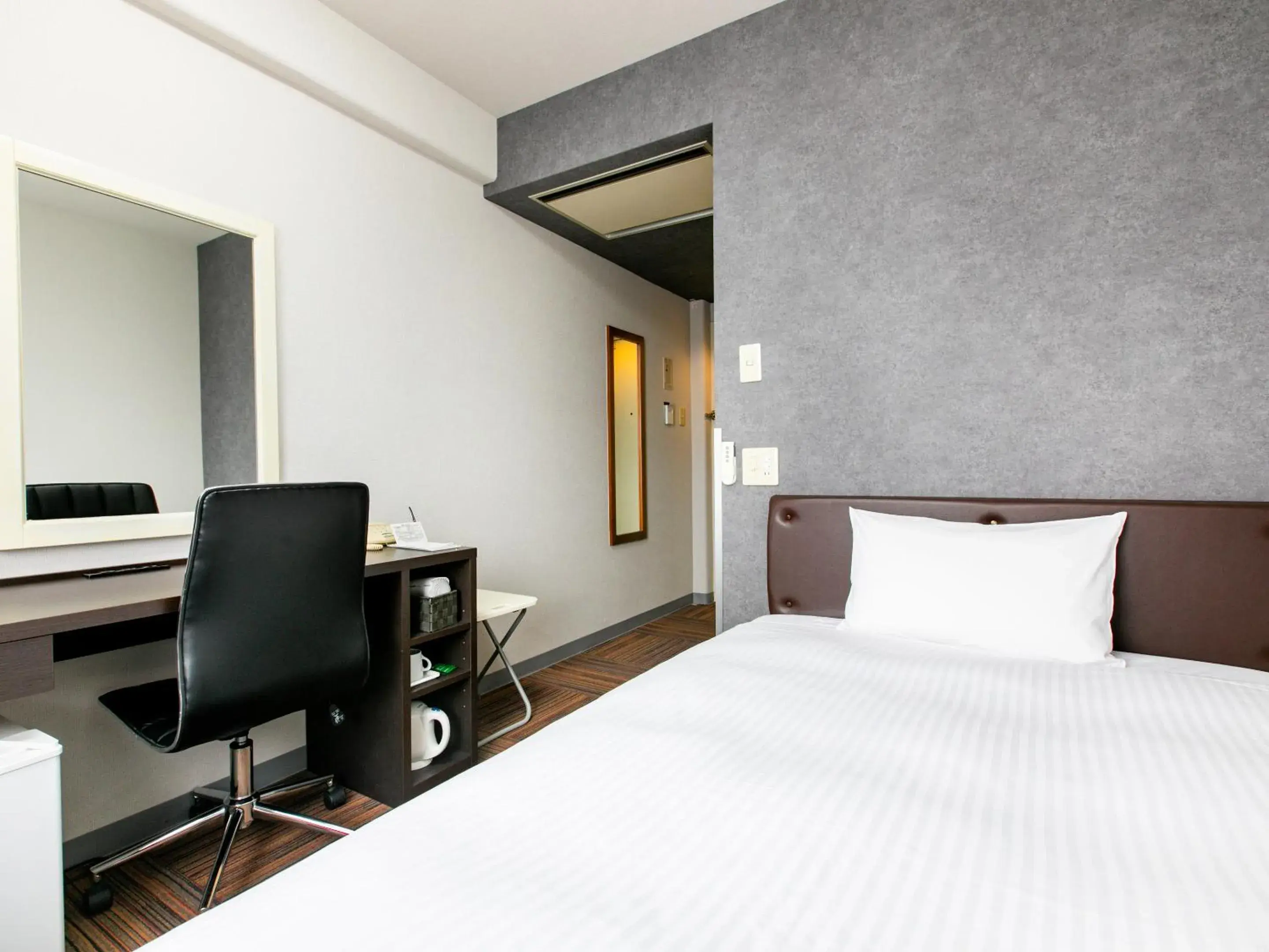 Bed in KOKO STAY Miyakonojo - formerly Hotel Wing International Miyakonojo Bed in KOKO STAY Miyakonojo - formerly Hotel Wing International Miyakonojo