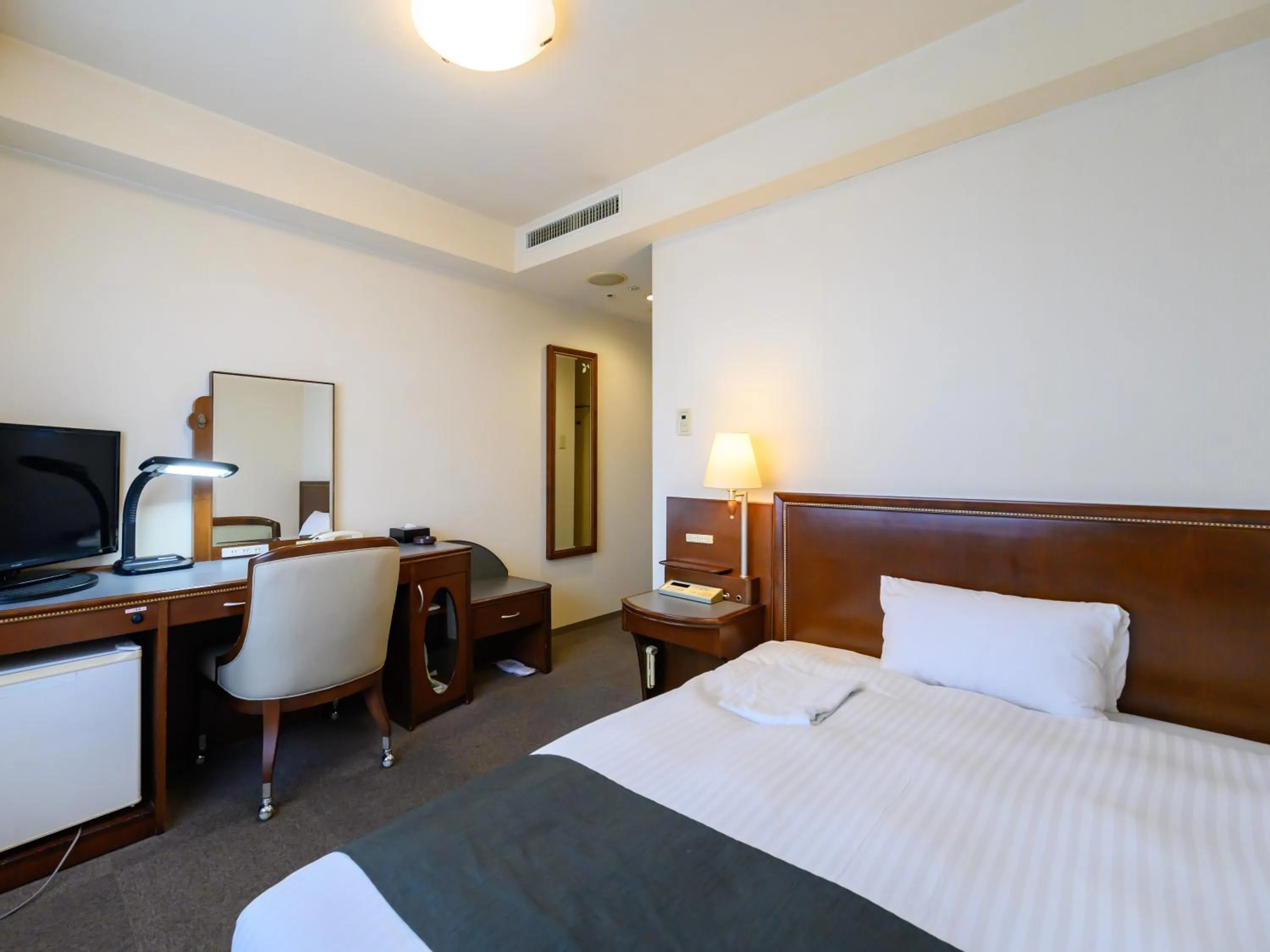 Bed in Hotel Green Park Tsu