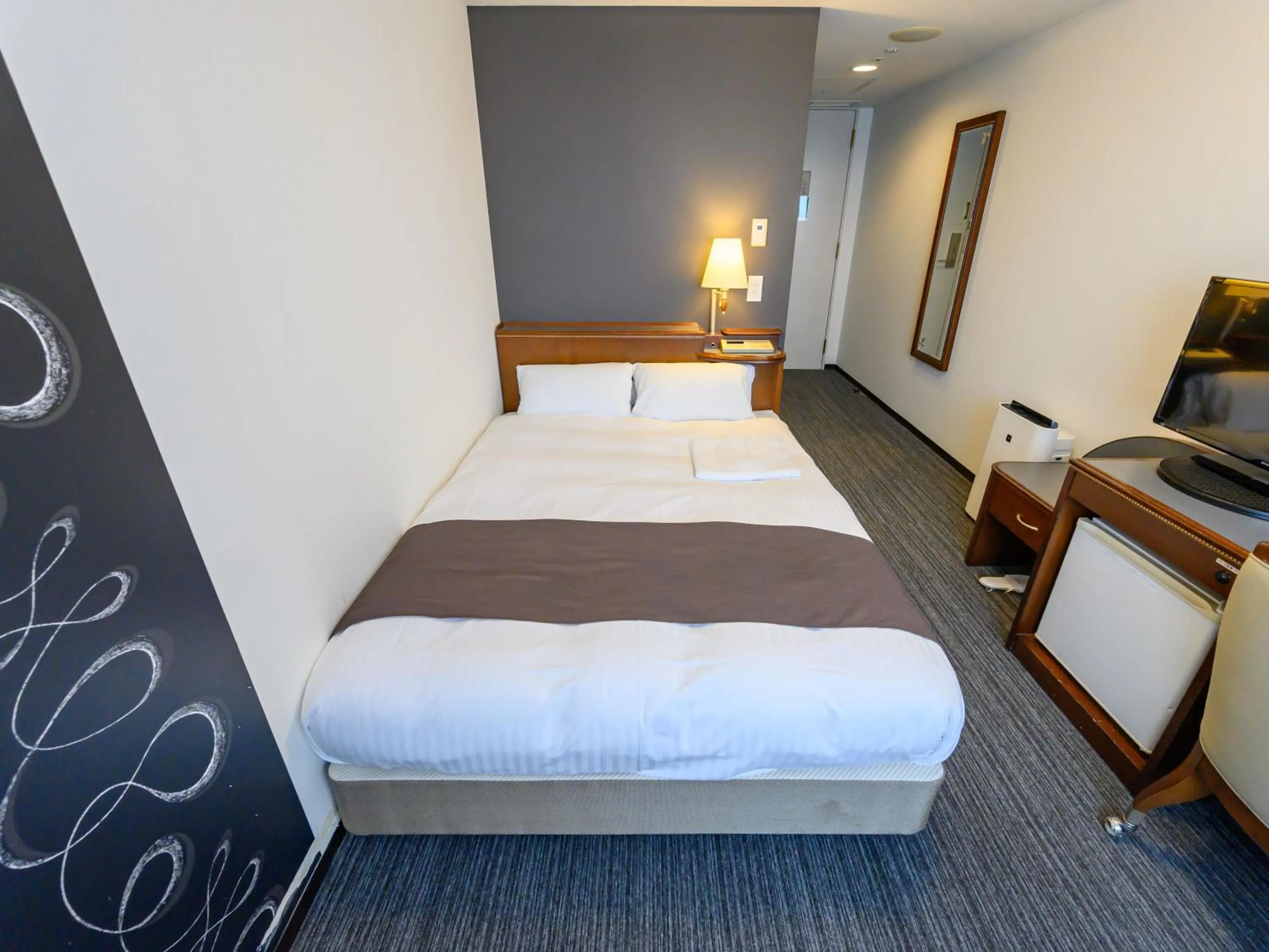 Bed in Hotel Green Park Tsu