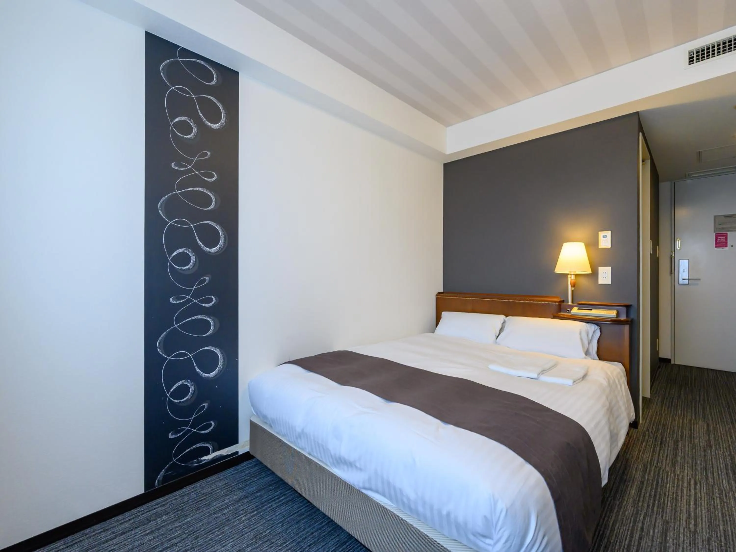 Bed in Hotel Green Park Tsu