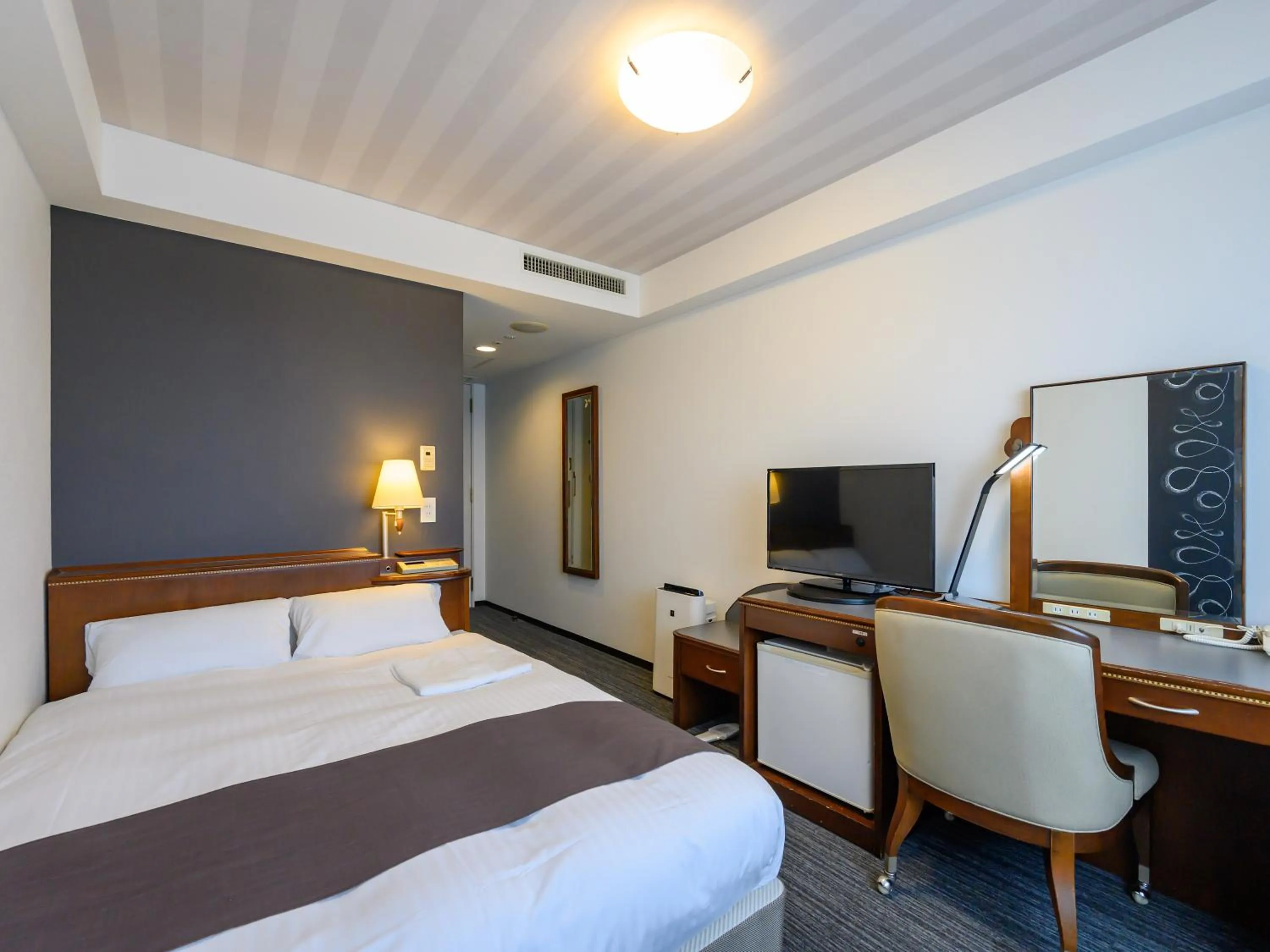 Photo of the whole room, Bed in Hotel Green Park Tsu