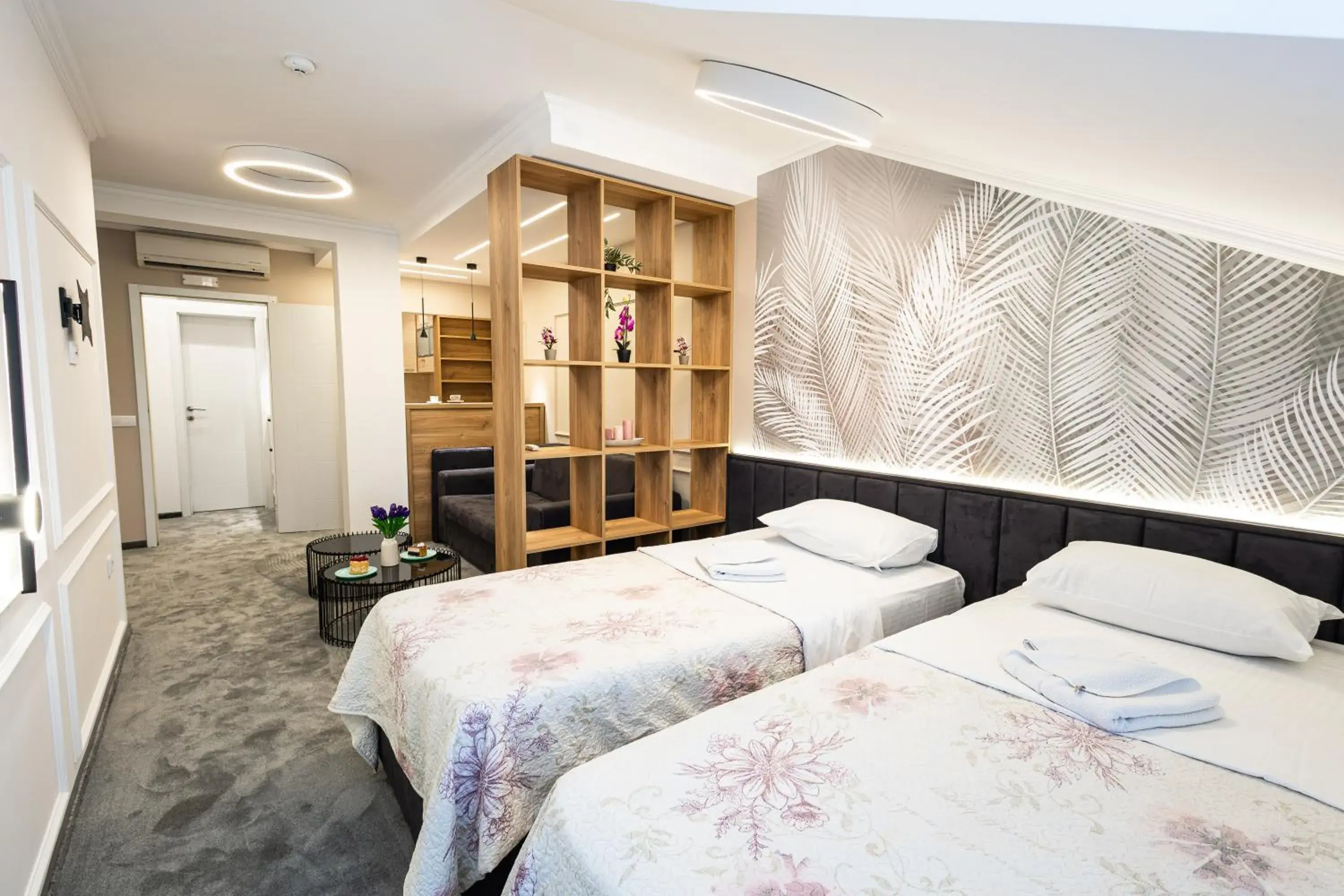 Kitchen or kitchenette, Bed in Garni Hotel Lotos Kitchen or kitchenette, Bed in Garni Hotel Lotos