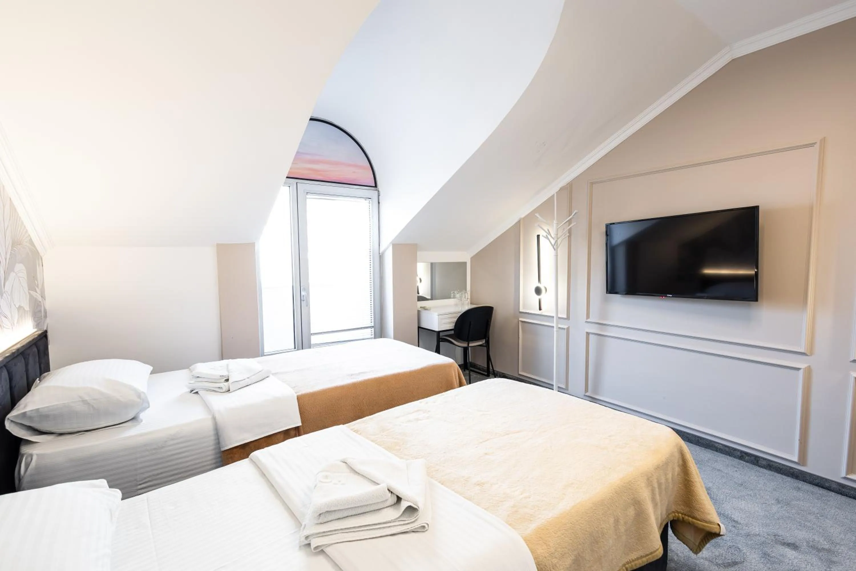 Bed in Garni Hotel Lotos