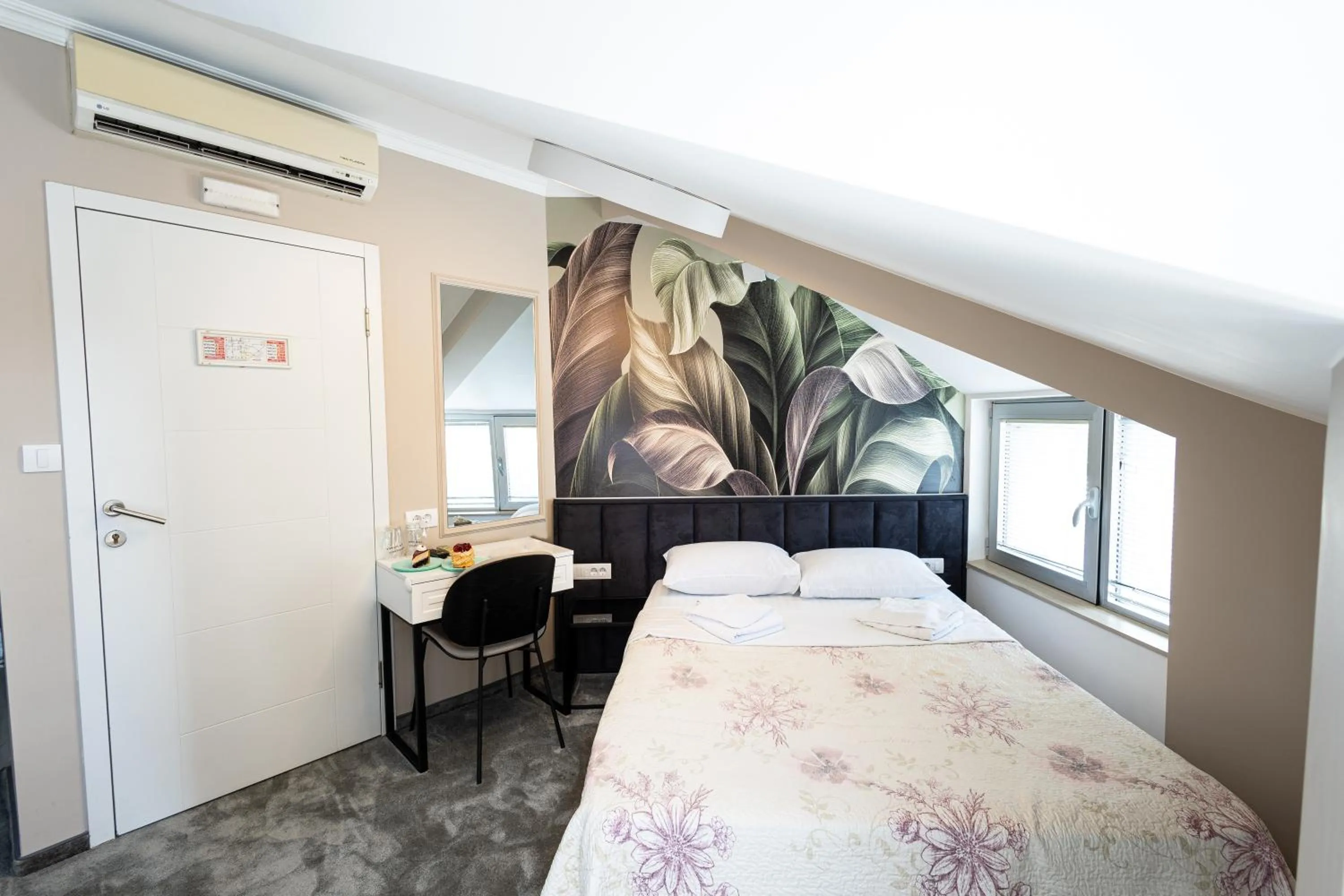 Bed in Garni Hotel Lotos