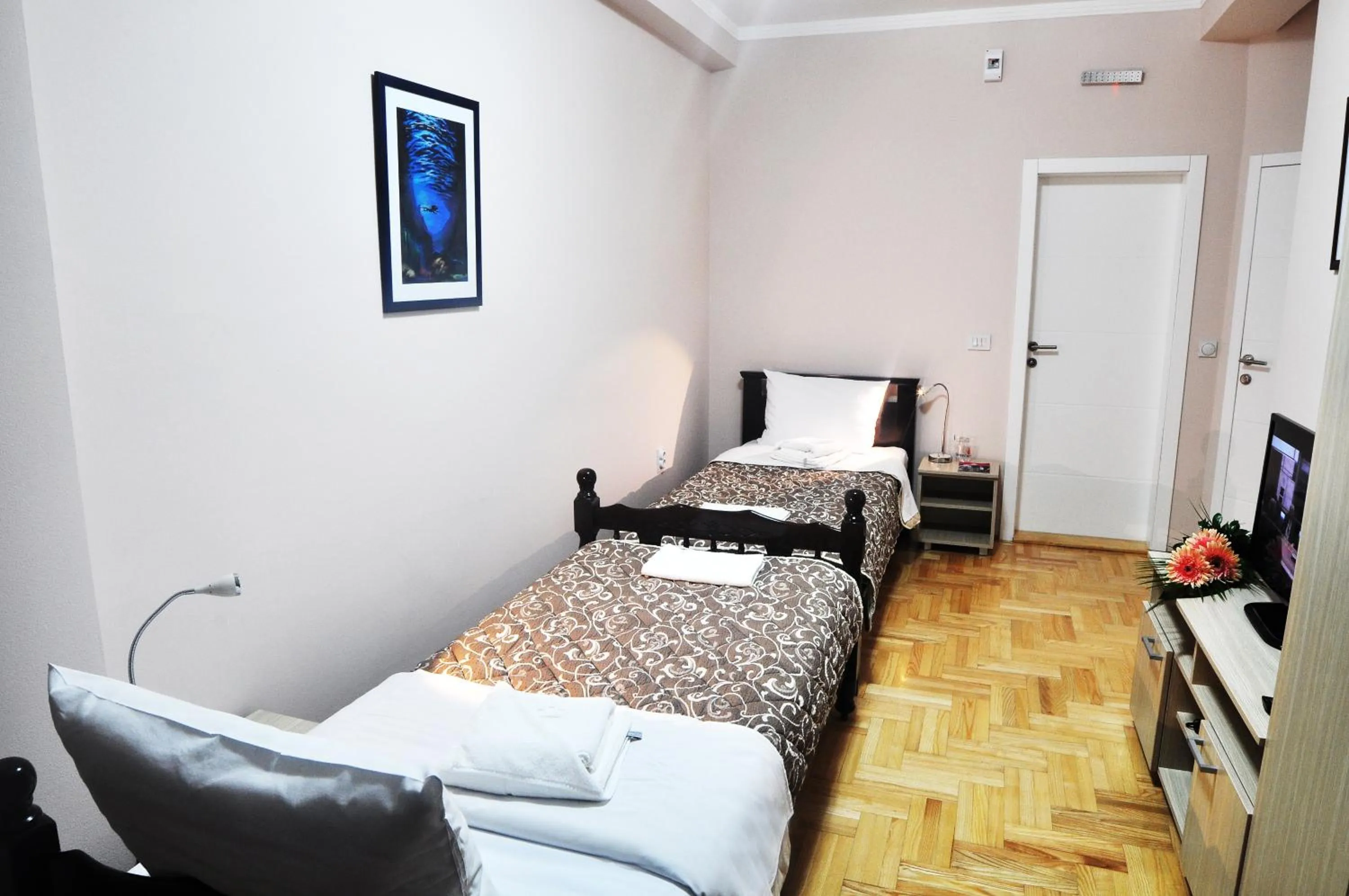 Bed in Garni Hotel Lotos