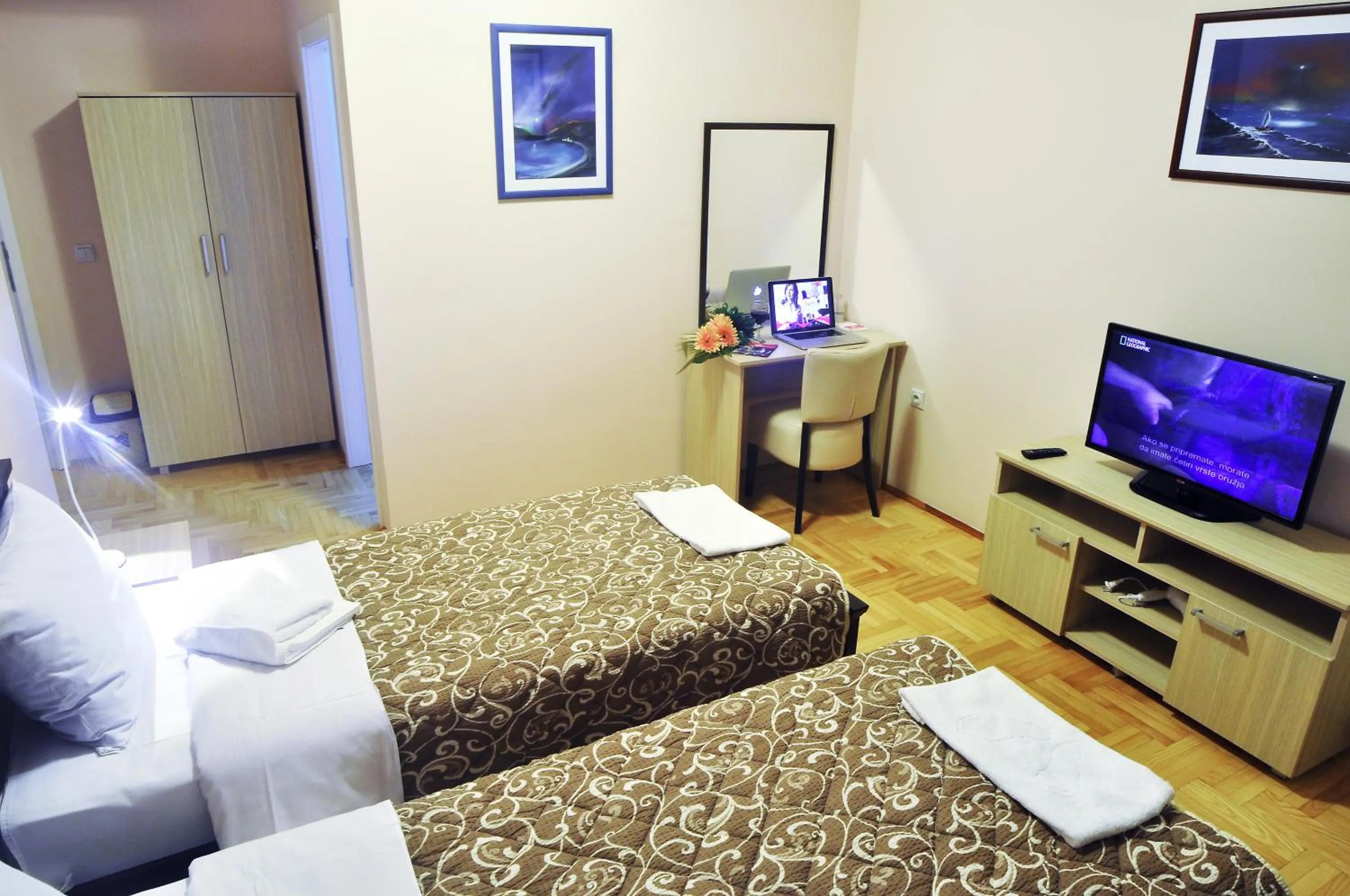 Bed in Garni Hotel Lotos
