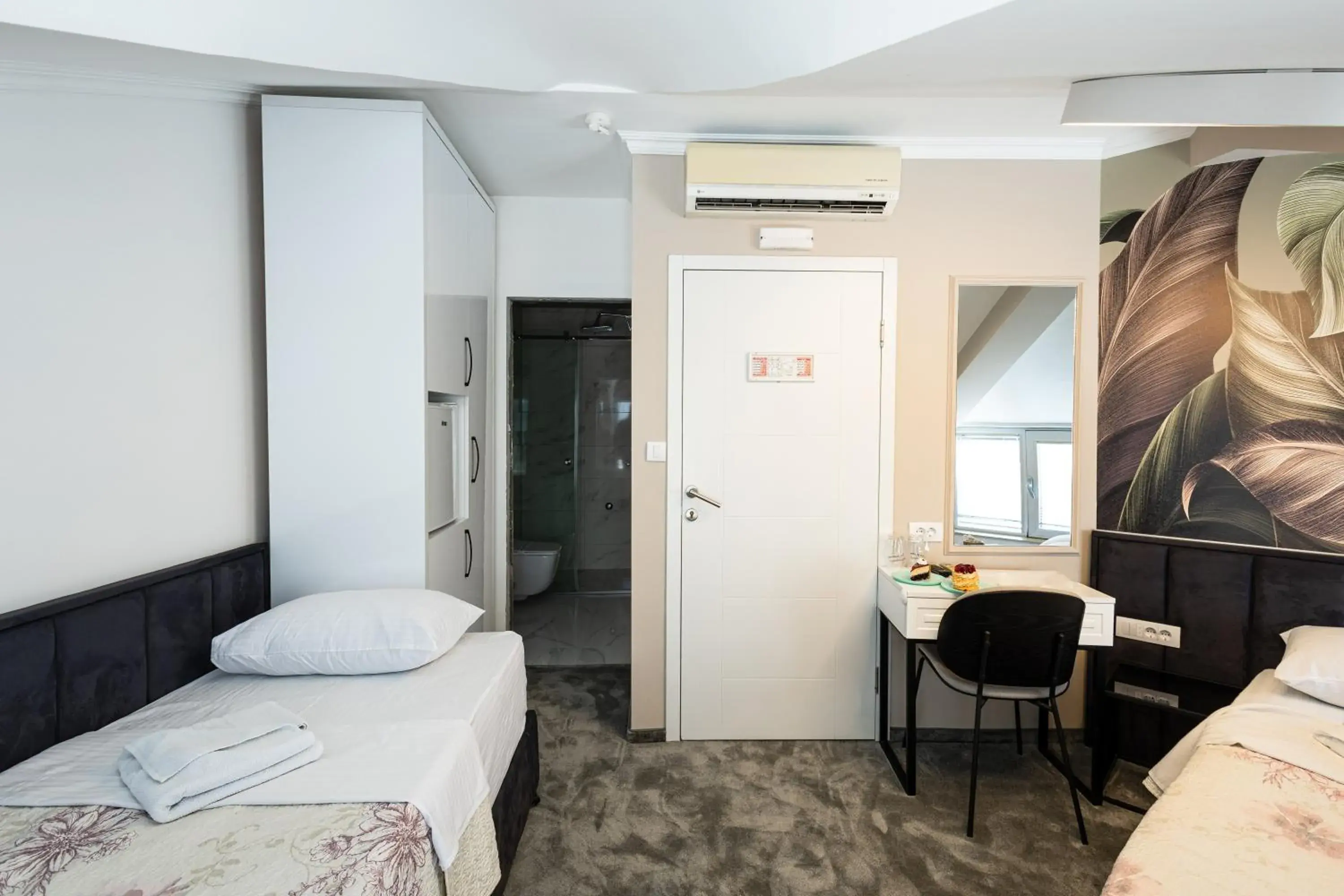 Seating area, Bed in Garni Hotel Lotos Seating area, Bed in Garni Hotel Lotos