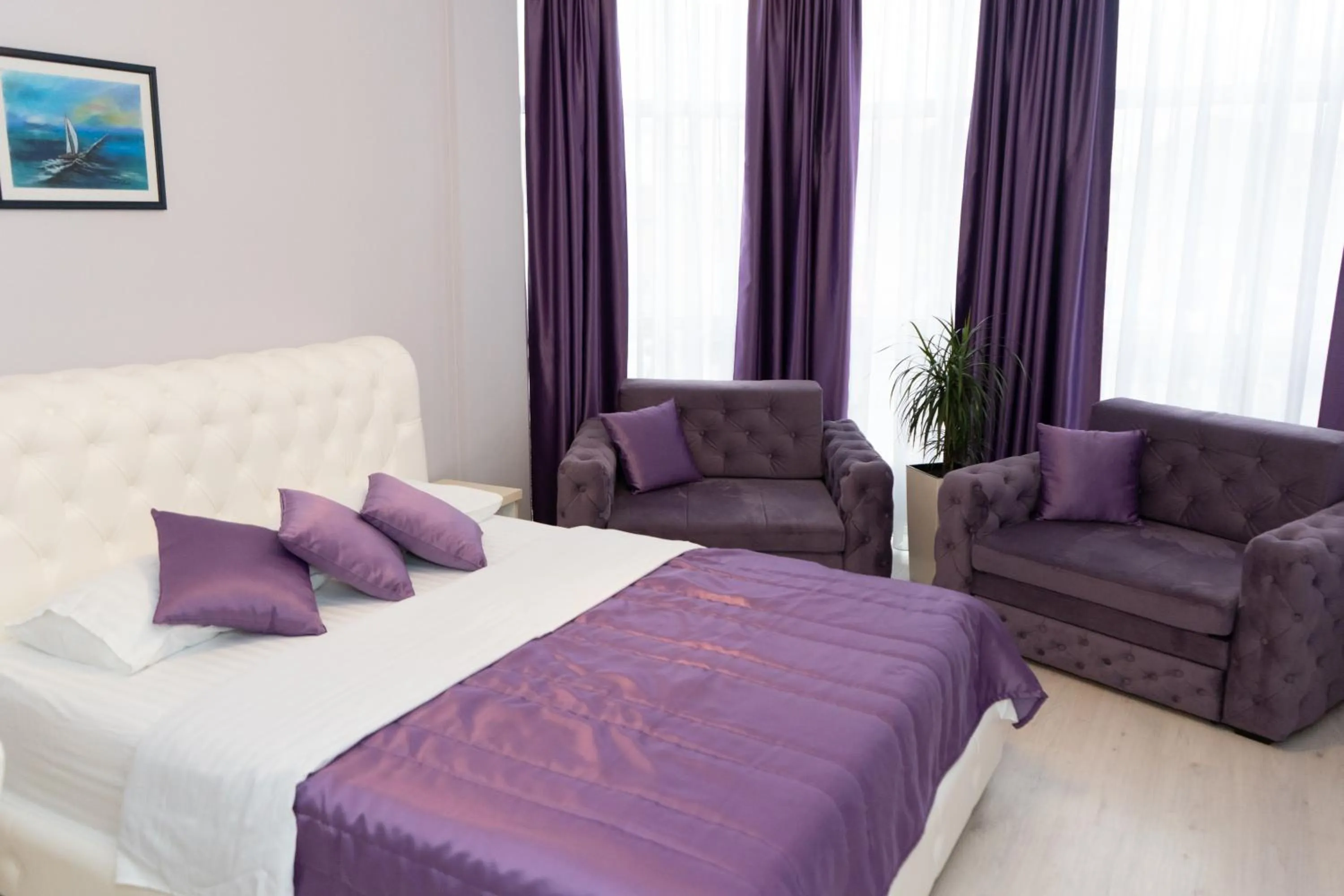 Bed in Garni Hotel Lotos