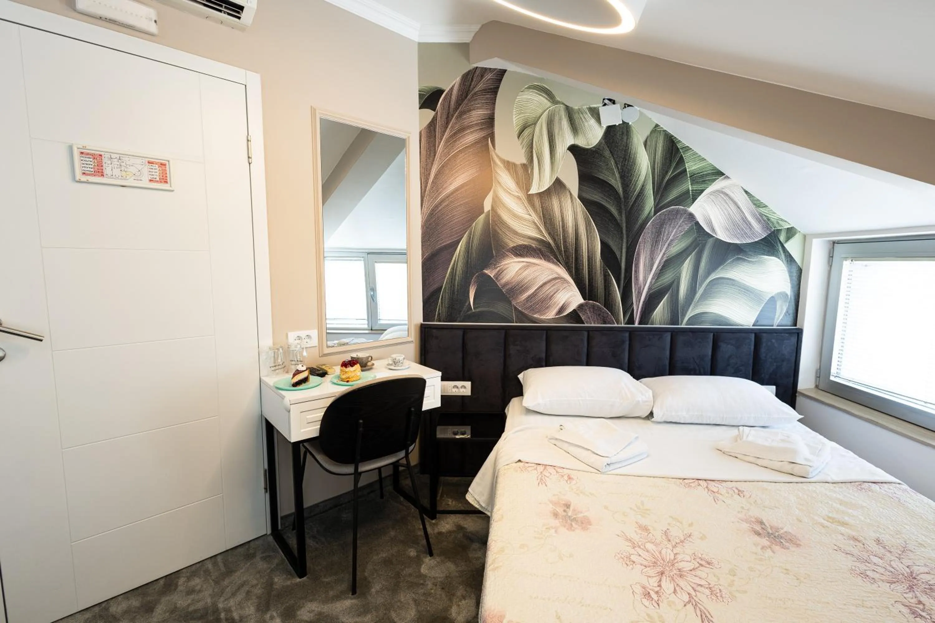 Bed in Garni Hotel Lotos